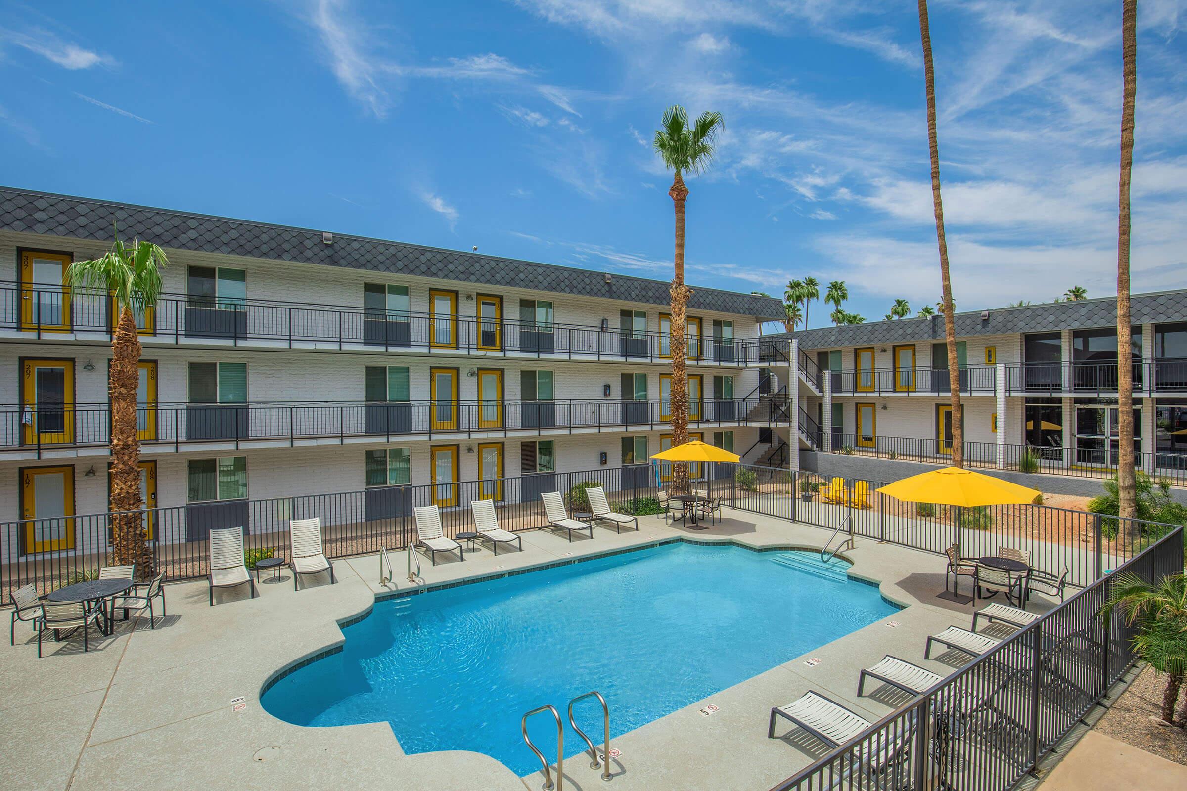 a pool in front of a building