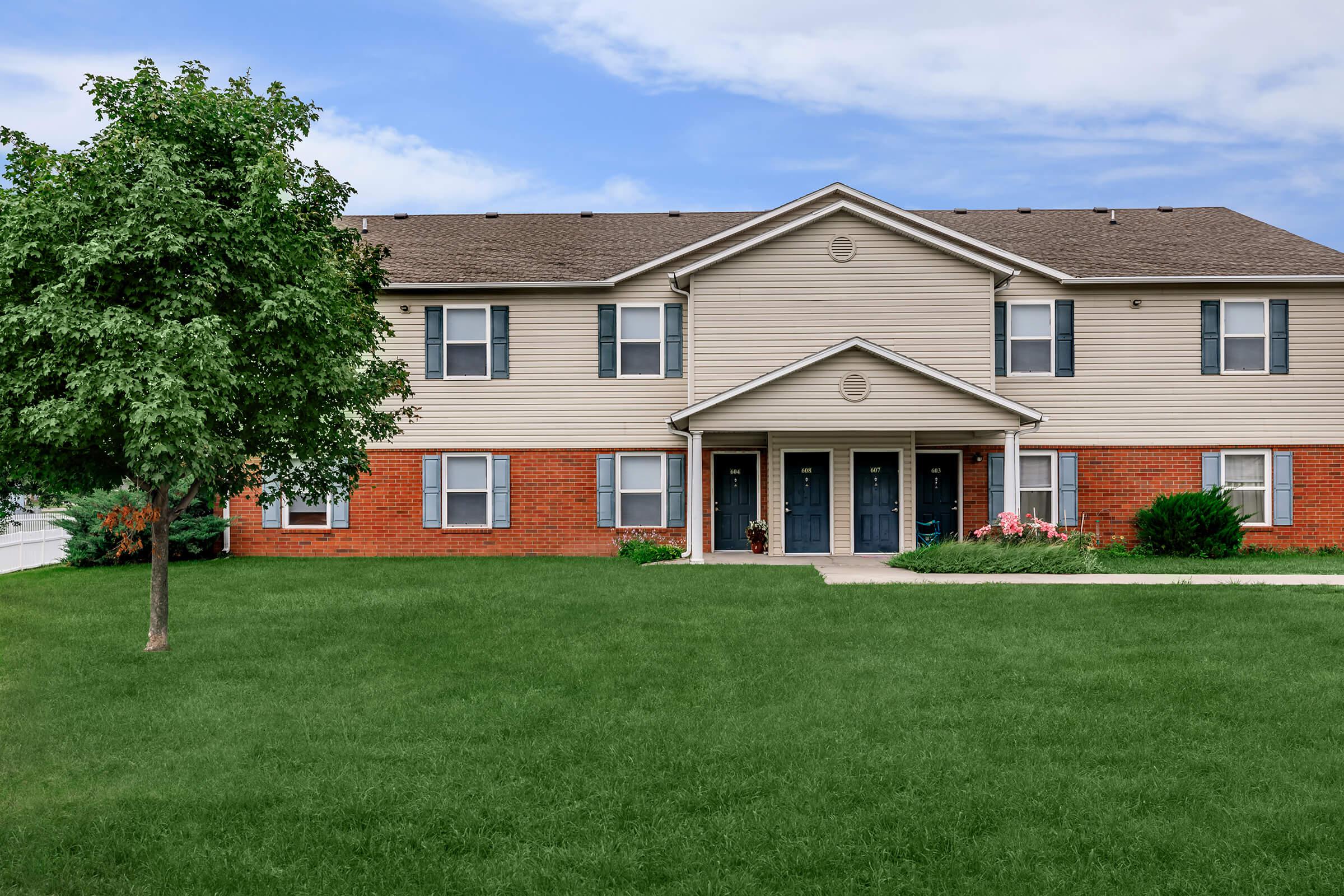 a large lawn in front of a house