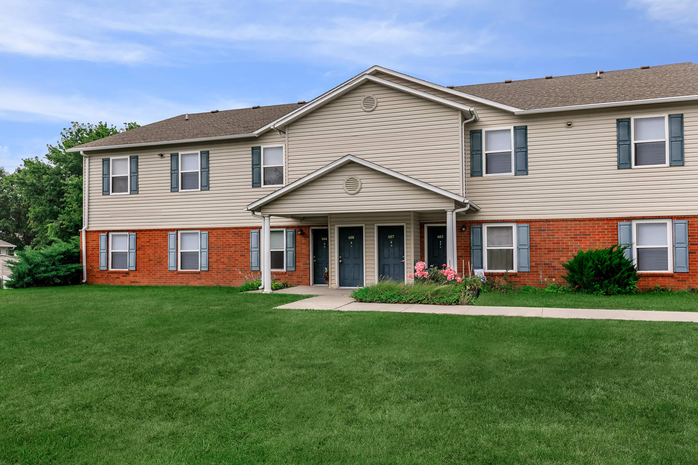 a large lawn in front of a house