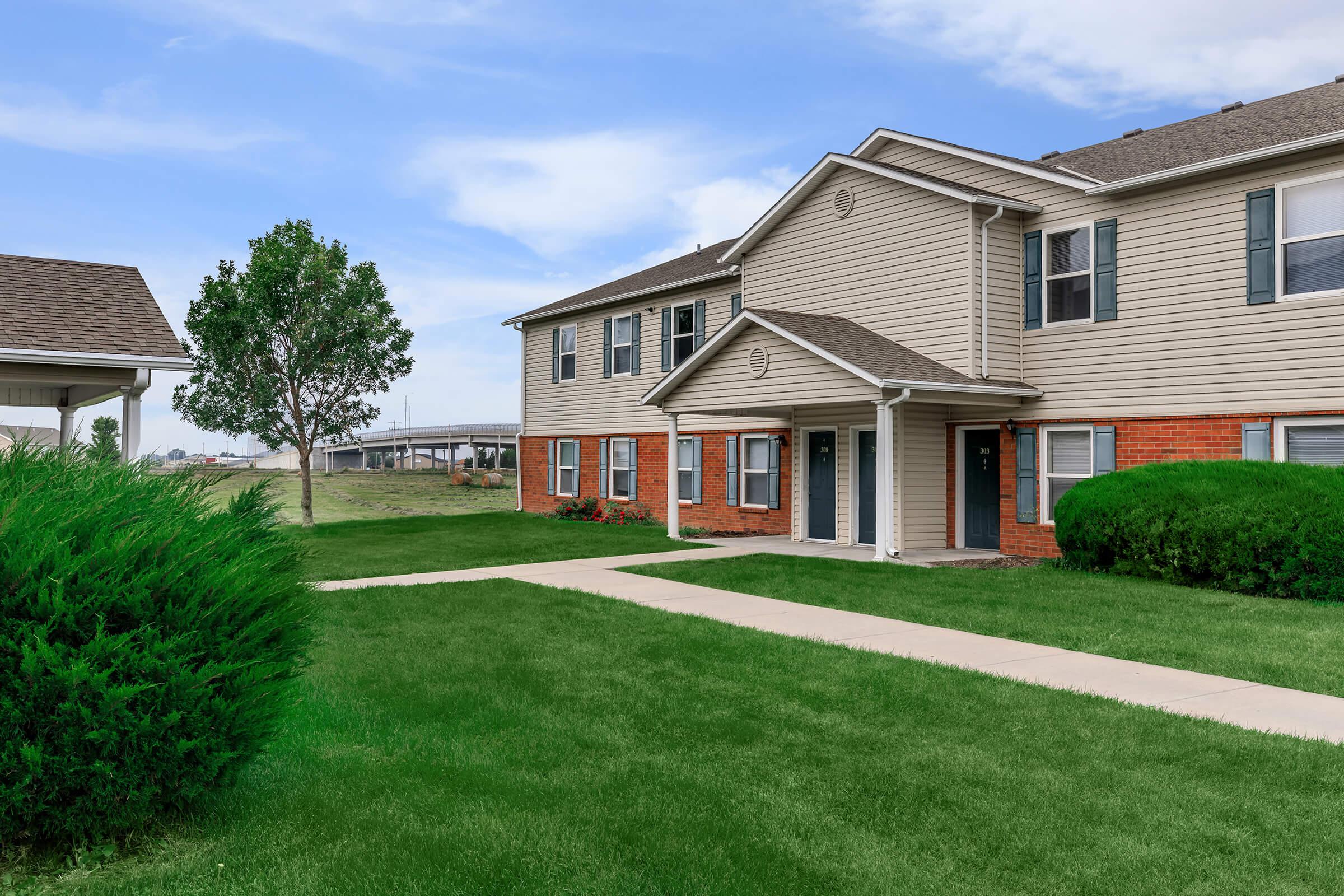 a large lawn in front of a house