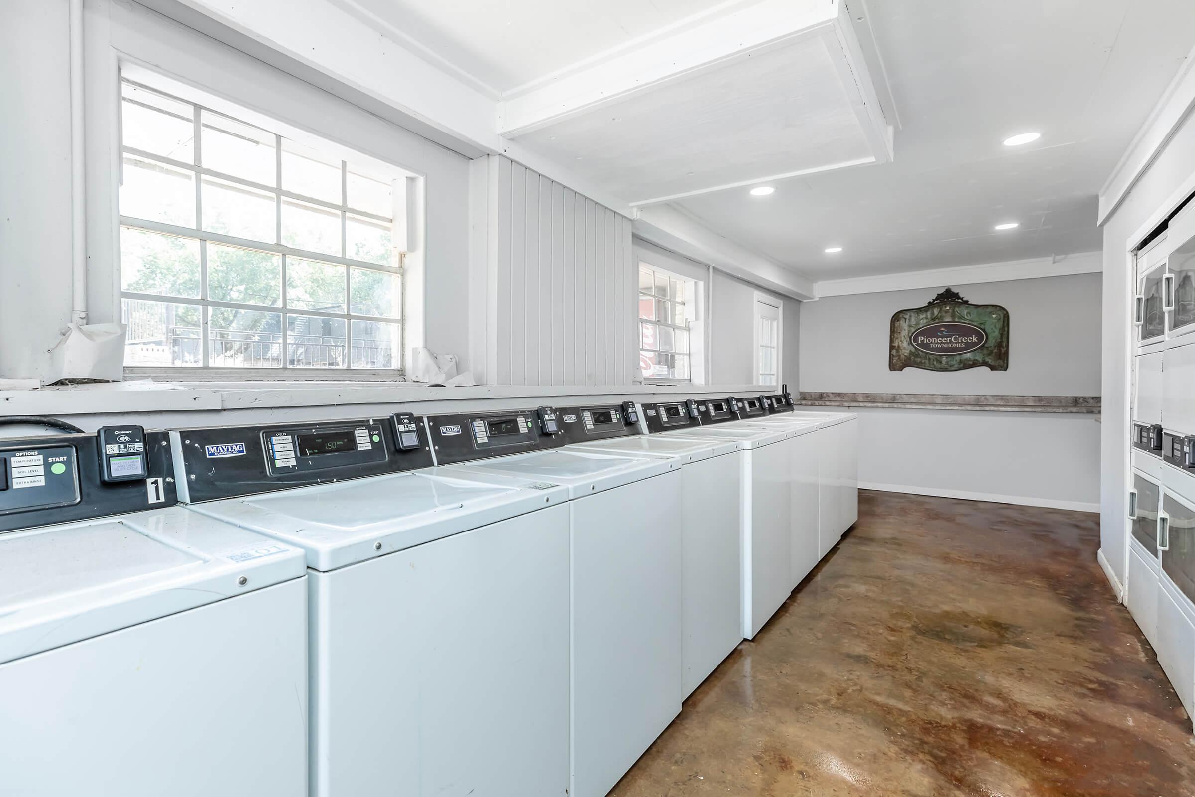 a kitchen with a large window