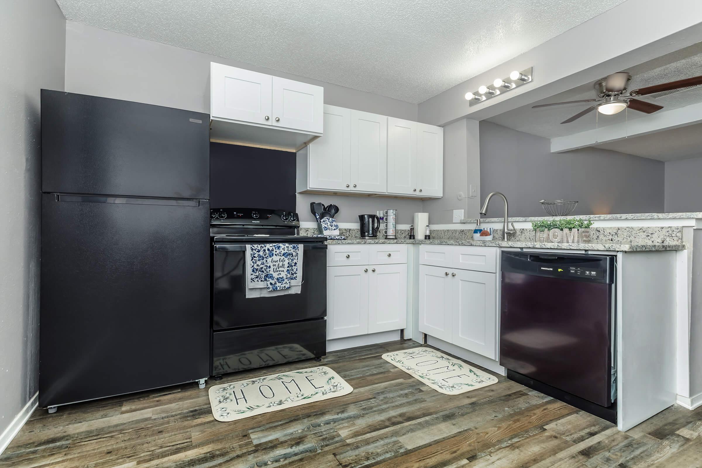 a modern kitchen with stainless steel appliances