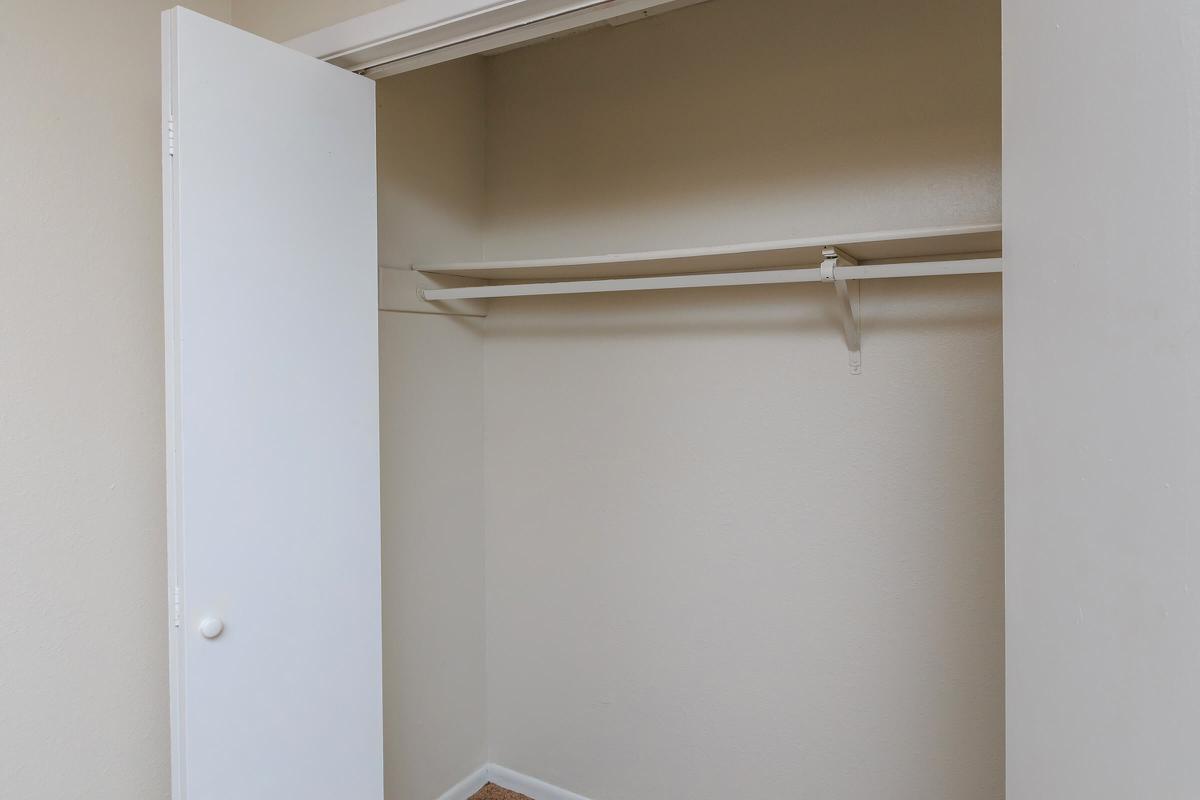 a white tub sitting next to a door