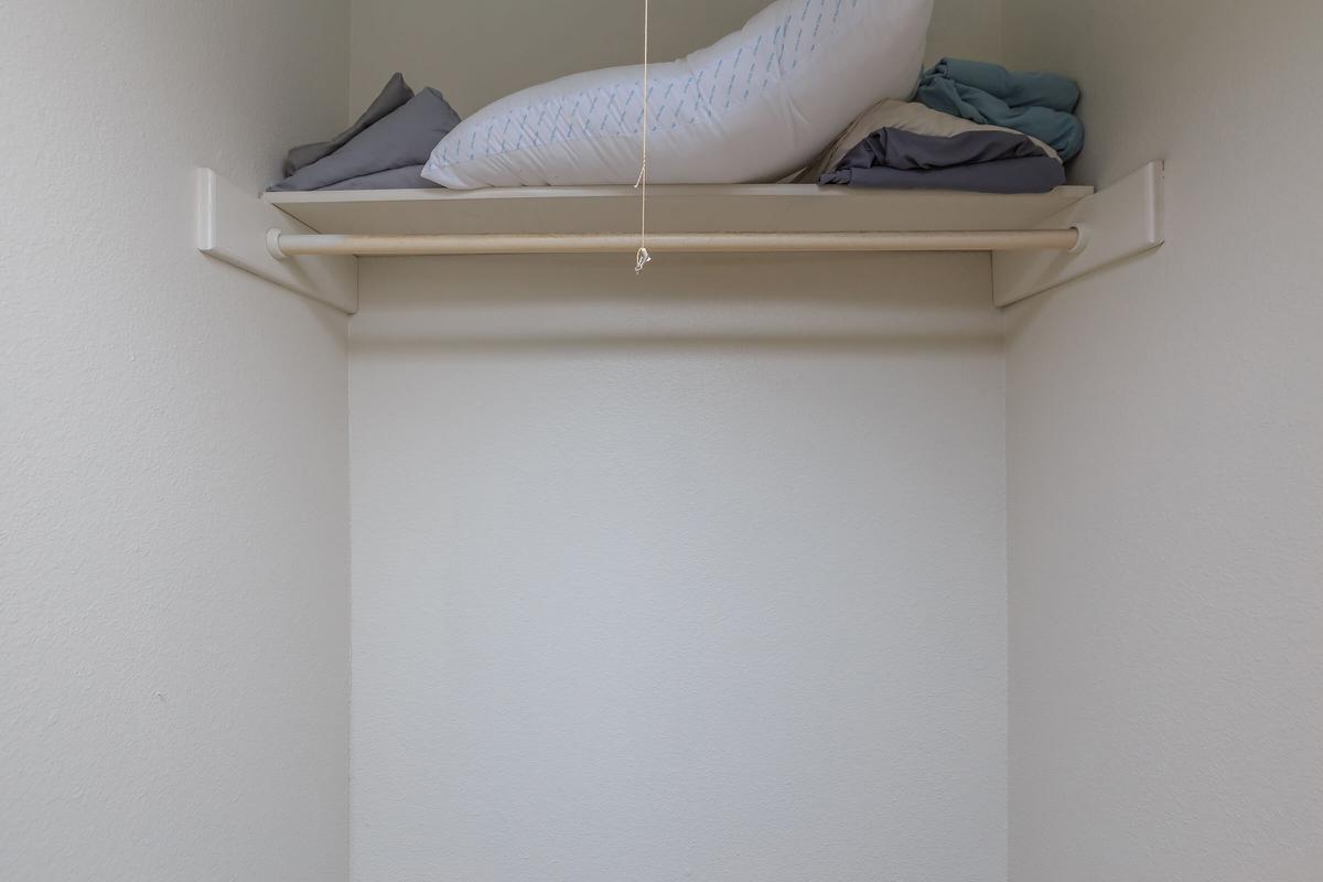 a white refrigerator freezer sitting in a room