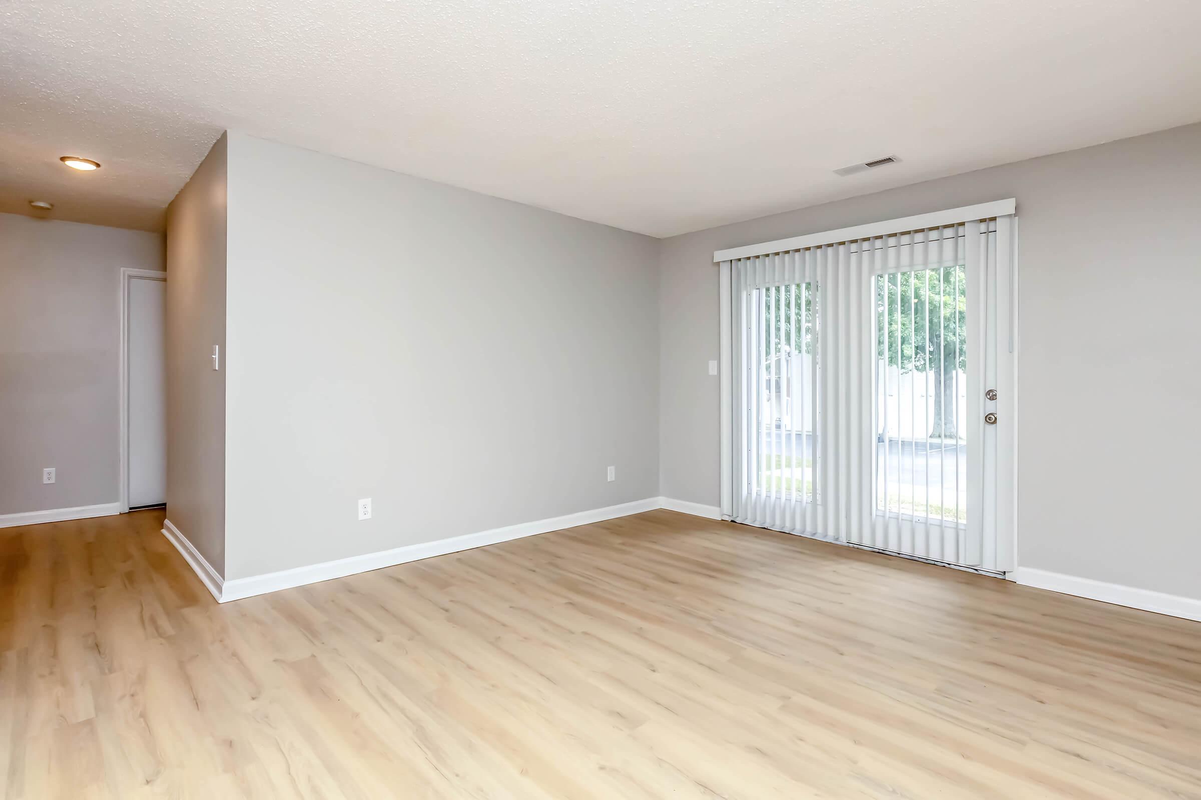 a room with a hard wood floor