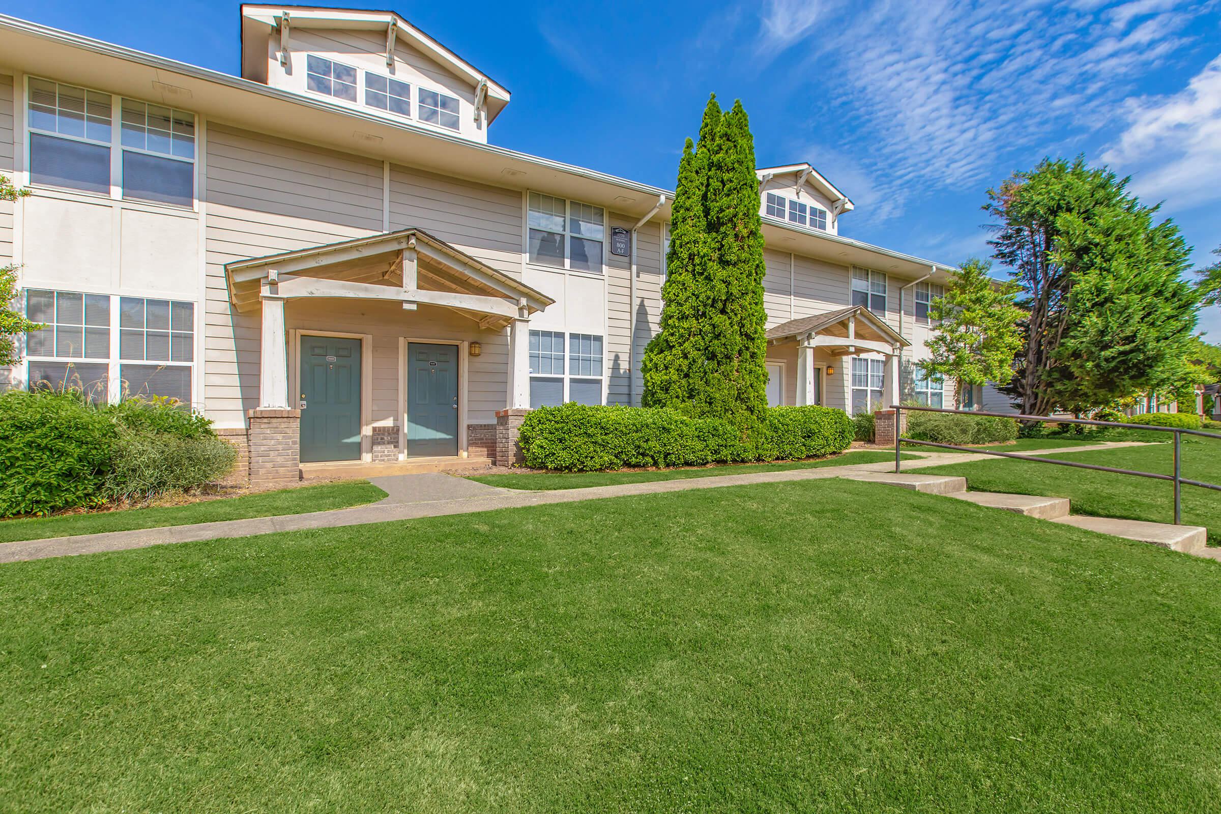 a large lawn in front of a house
