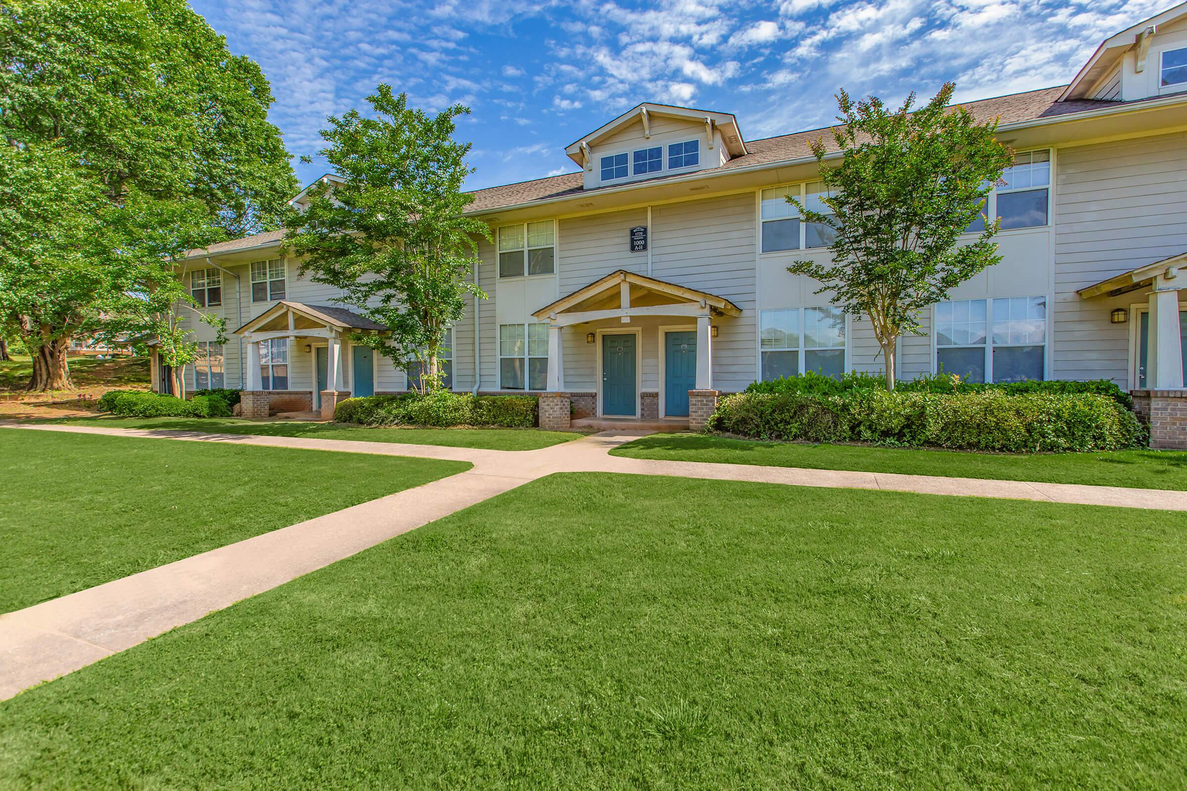 a large lawn in front of a house