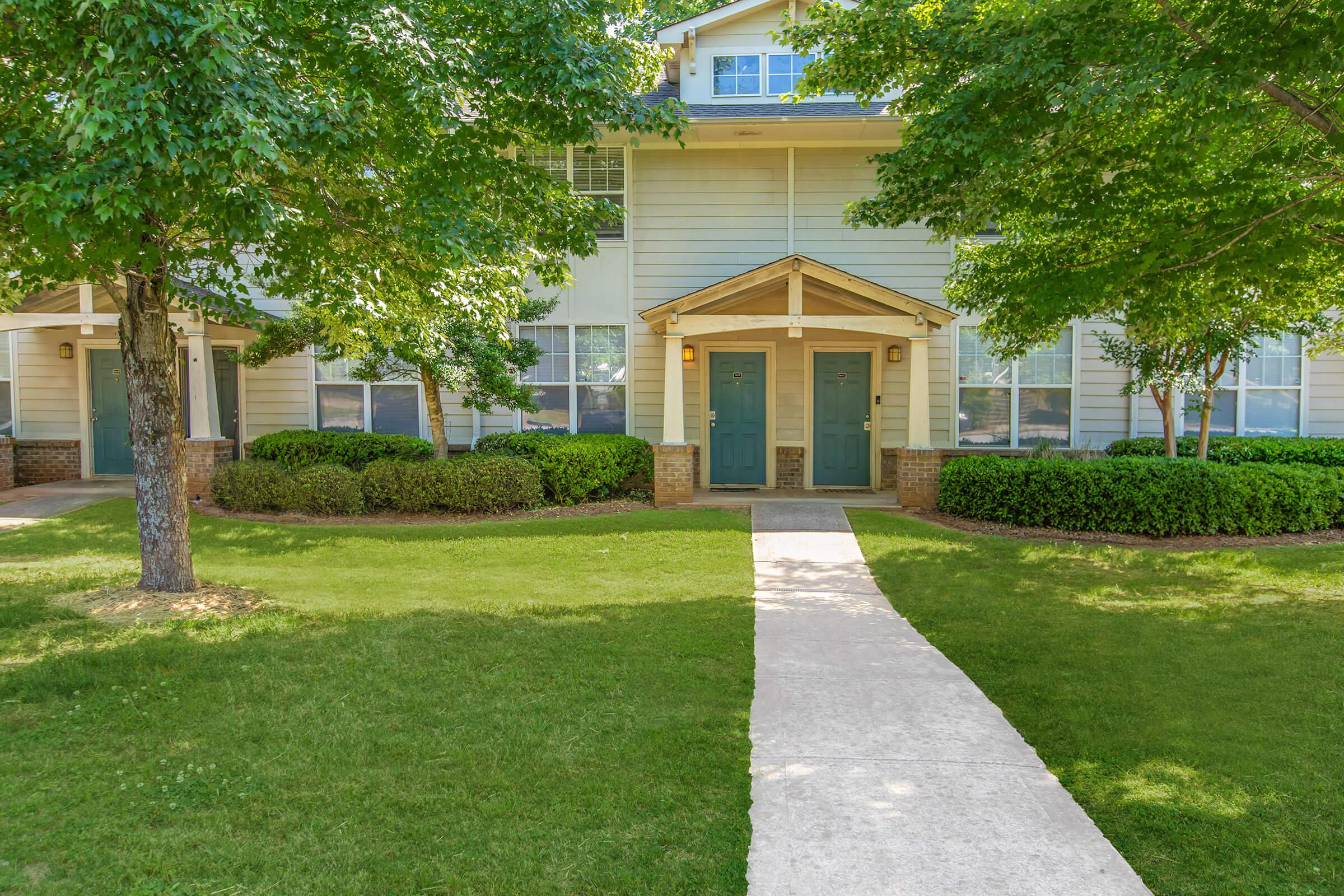 a large lawn in front of a house