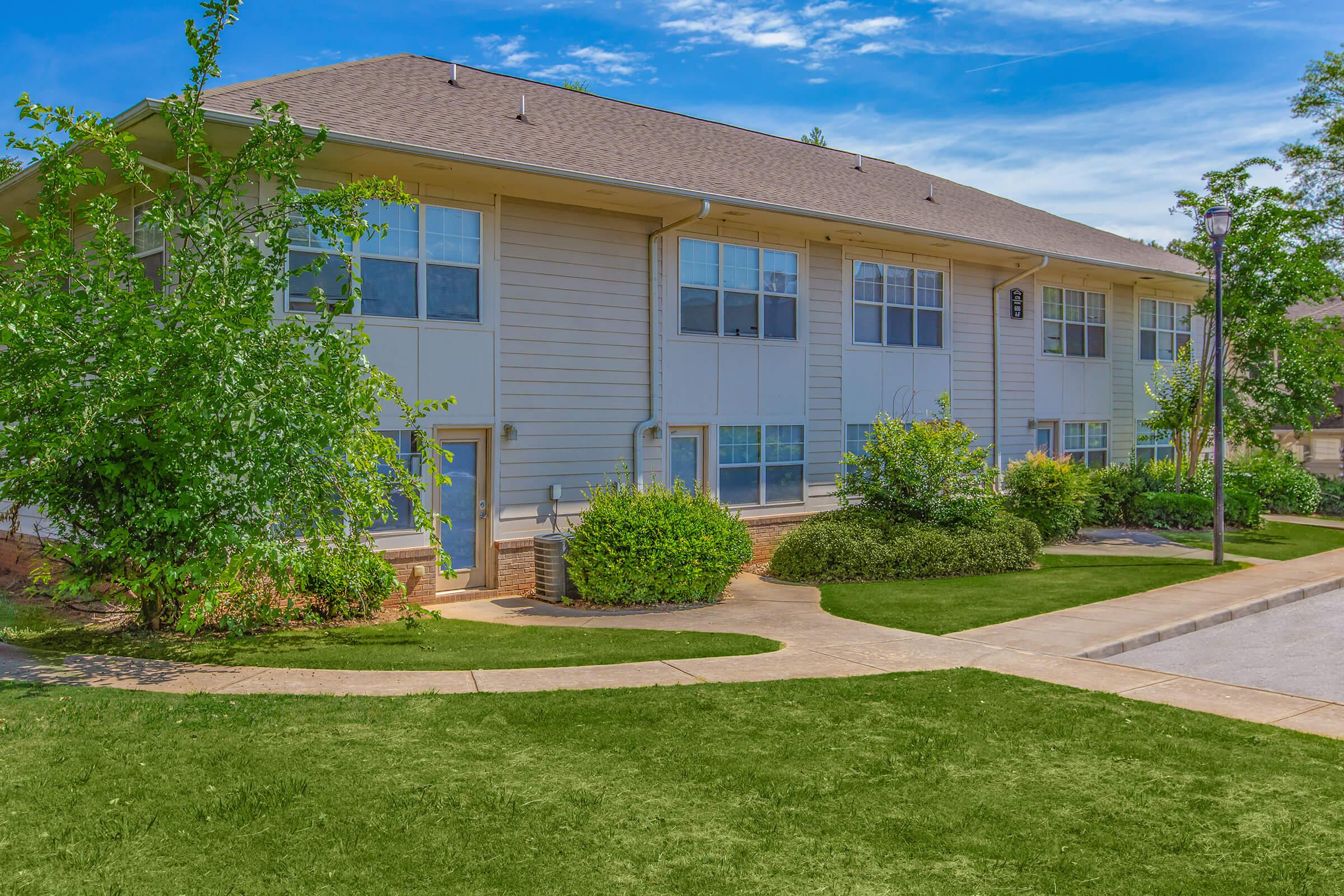 a large lawn in front of a house