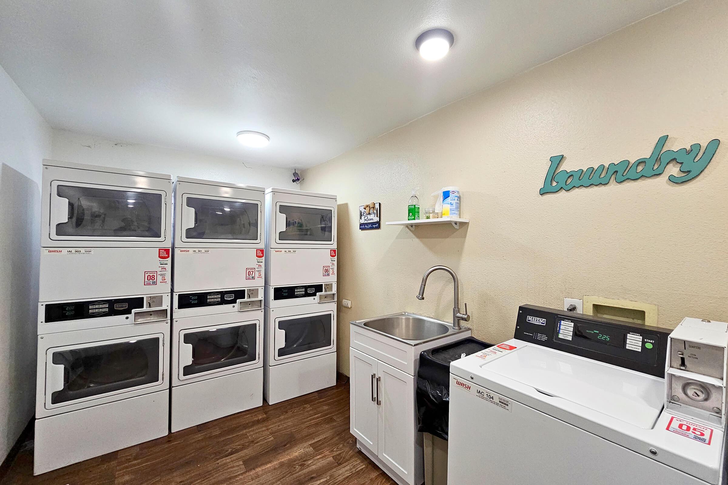 a kitchen with a stove and a refrigerator