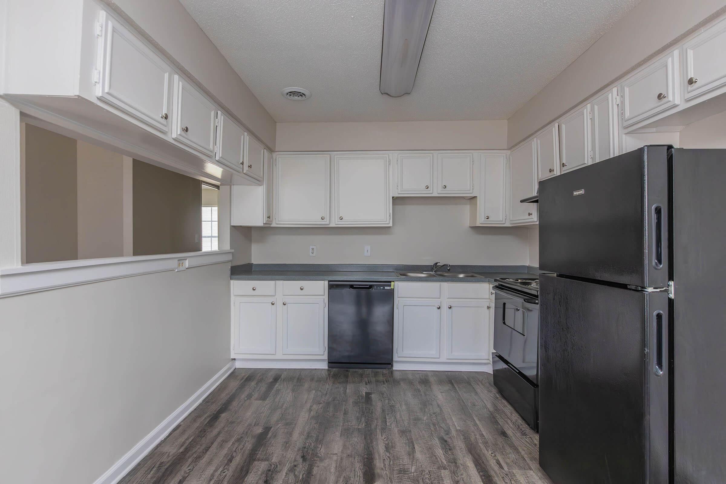 a stainless steel refrigerator in a kitchen