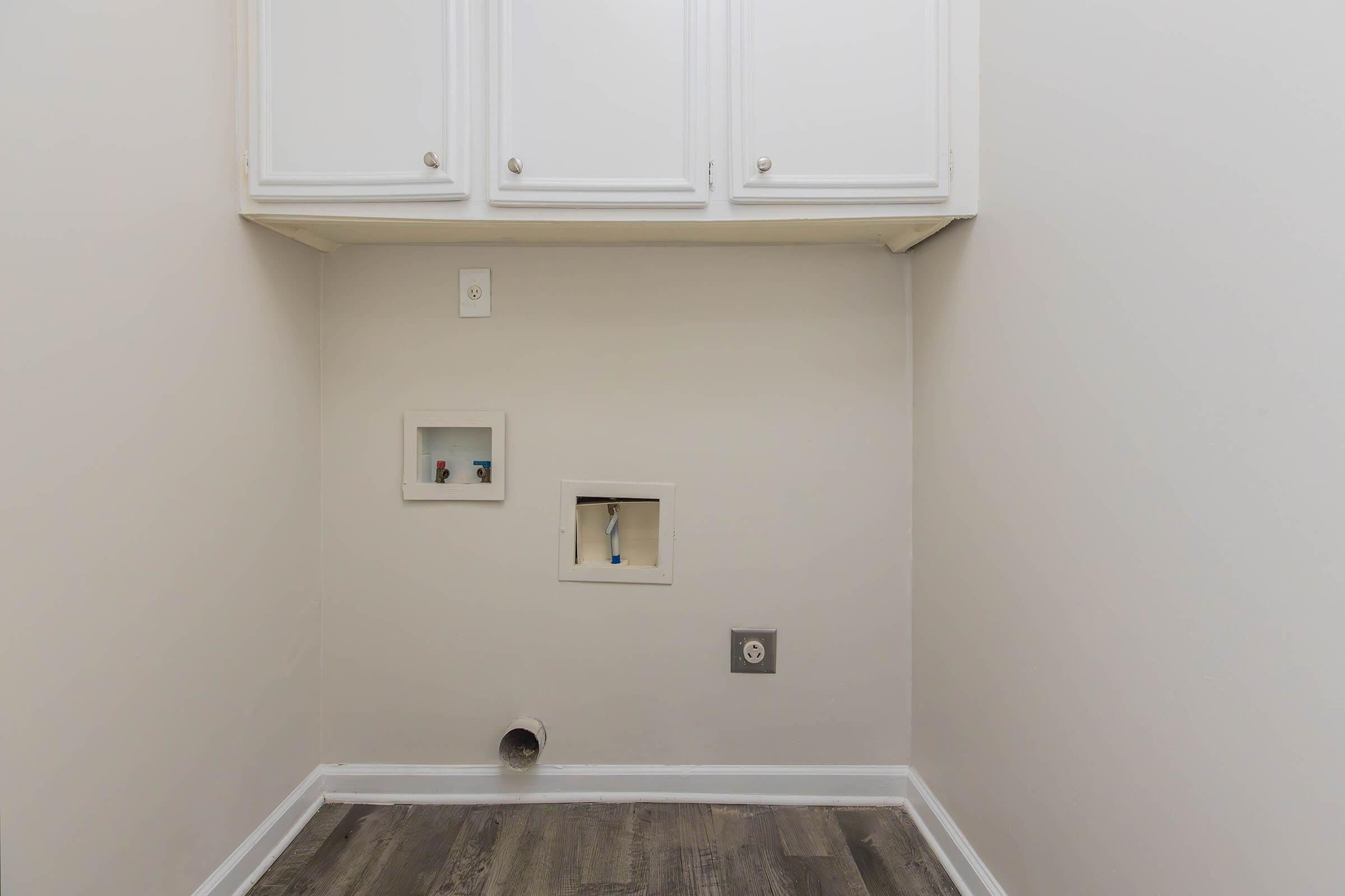 a close up of a sink in a small room