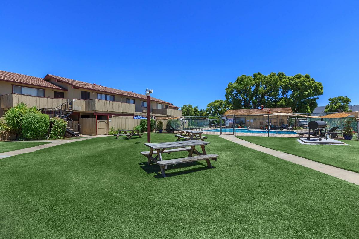 a large lawn in front of a building