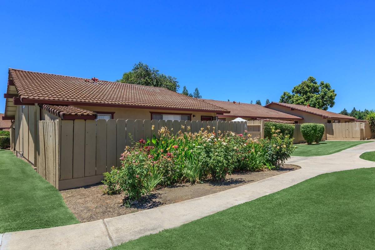 a large lawn in front of a house