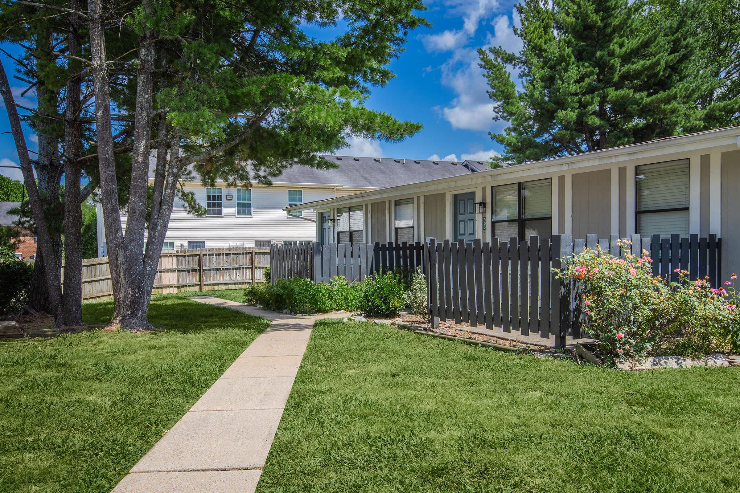 a large lawn in front of a house