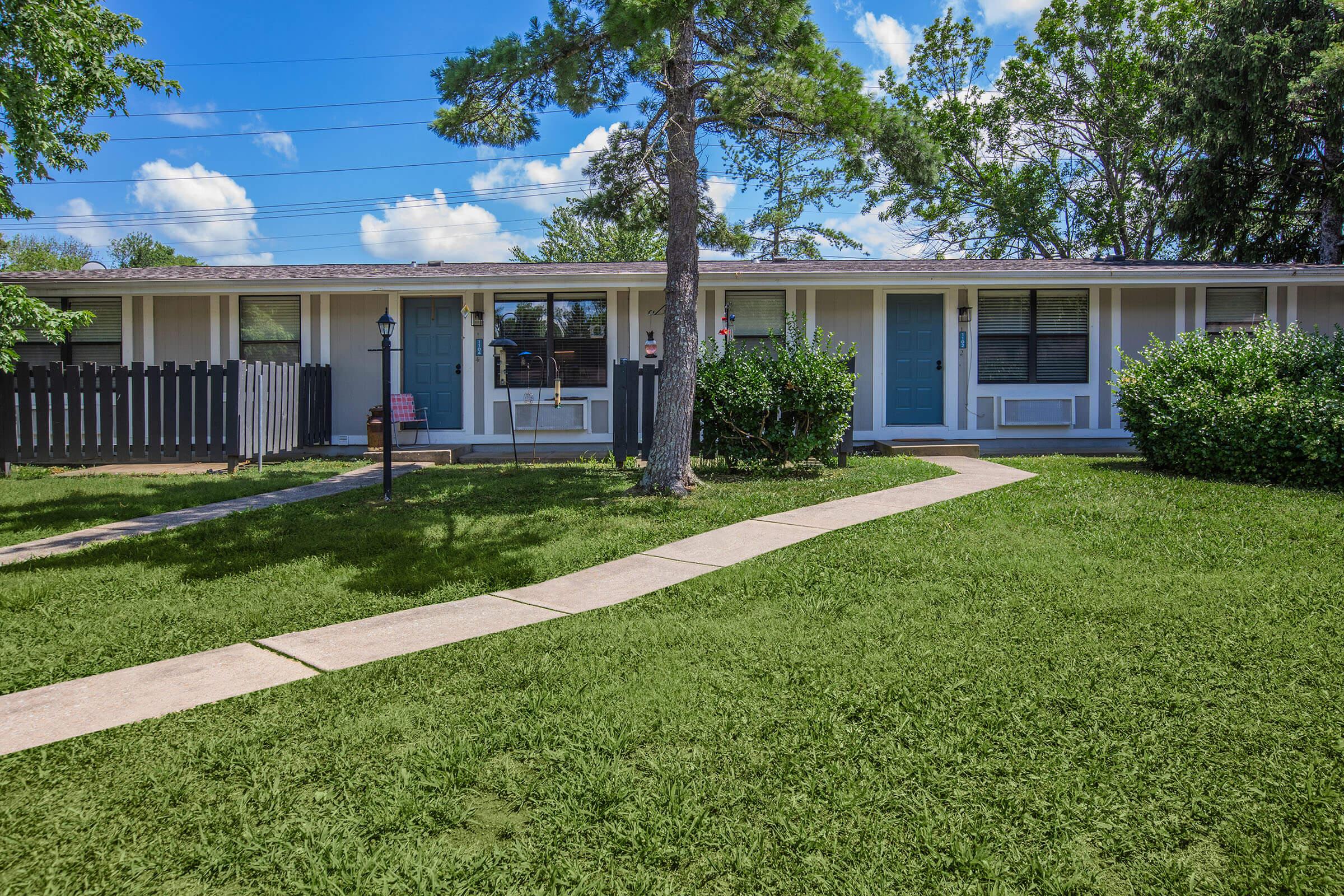 a large lawn in front of a house