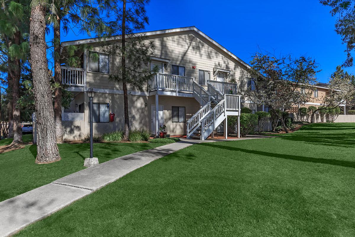 a large lawn in front of a house