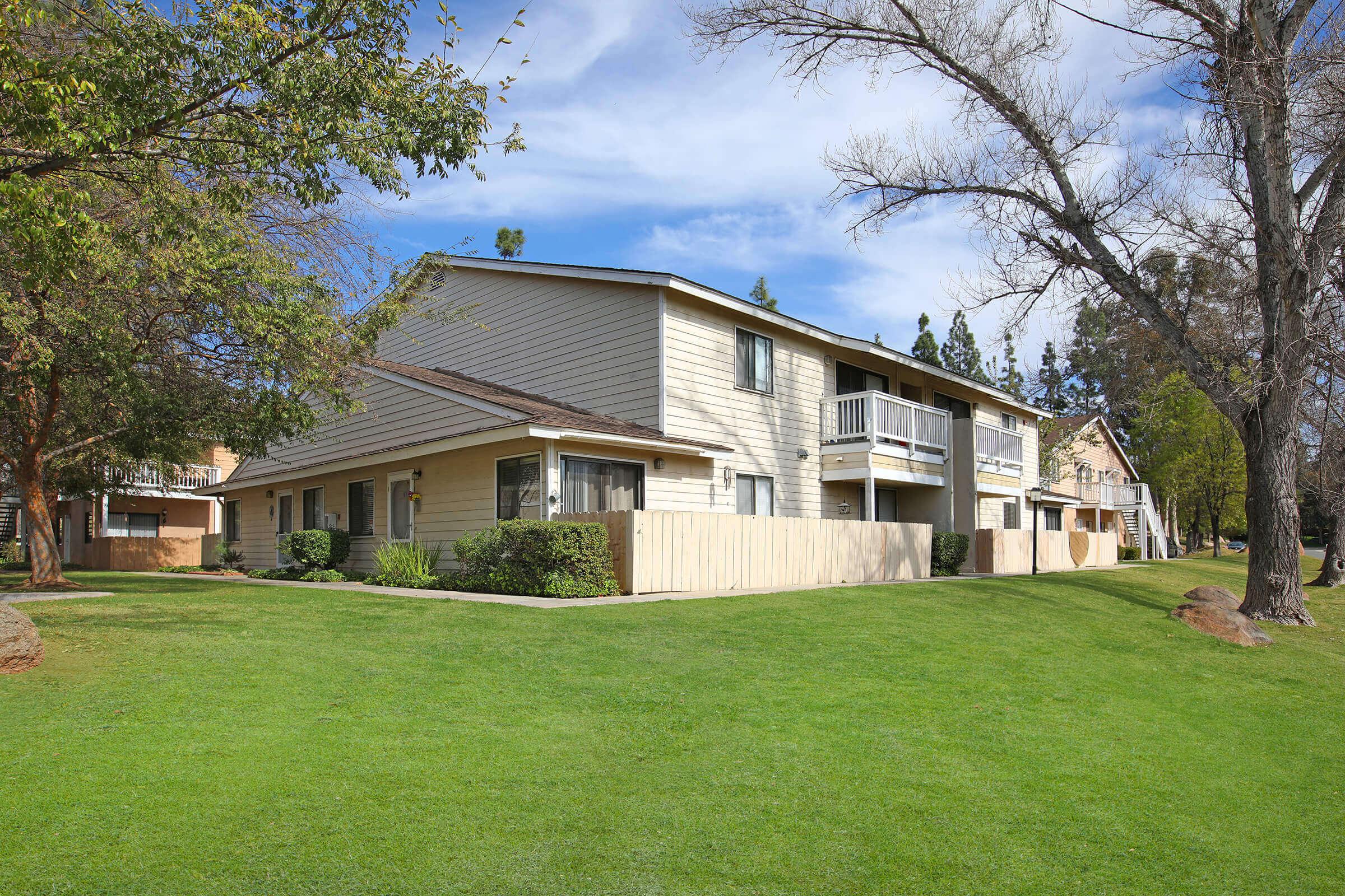 a large lawn in front of a house