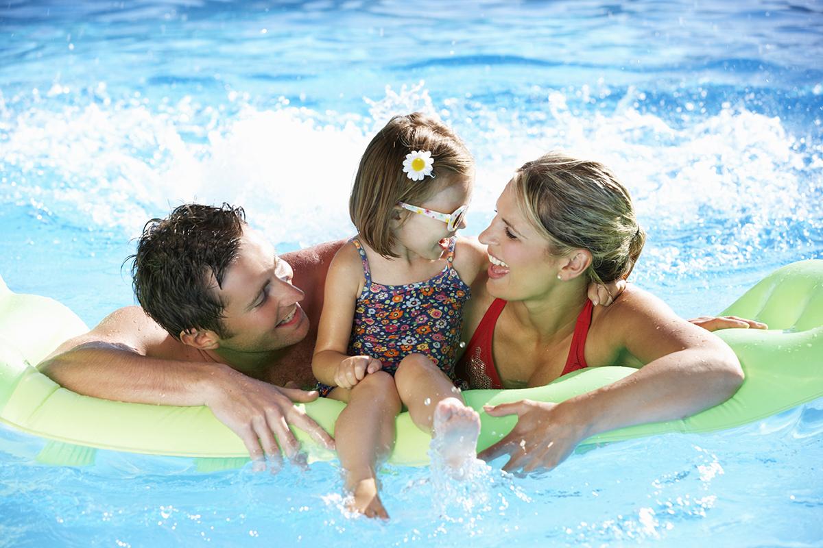 a girl in a pool of water