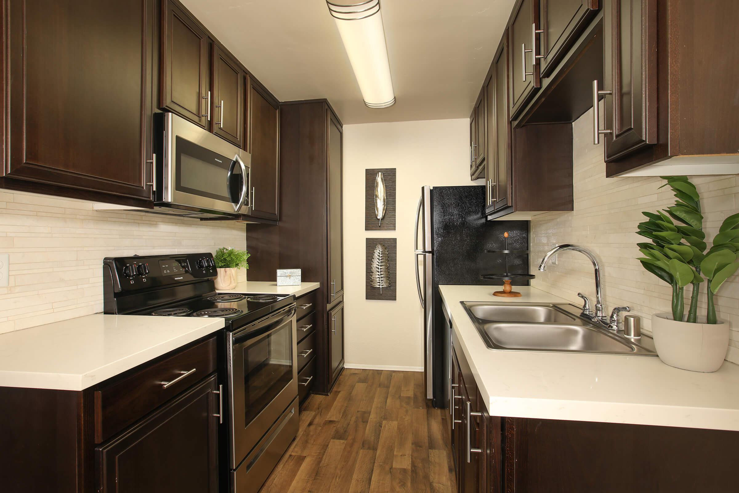 a modern kitchen with stainless steel appliances