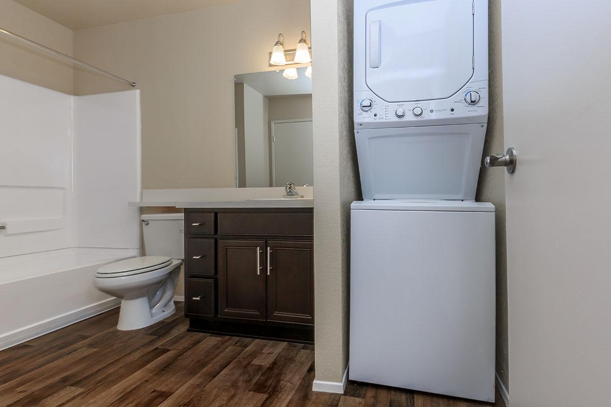 a large white tub sitting next to a sink