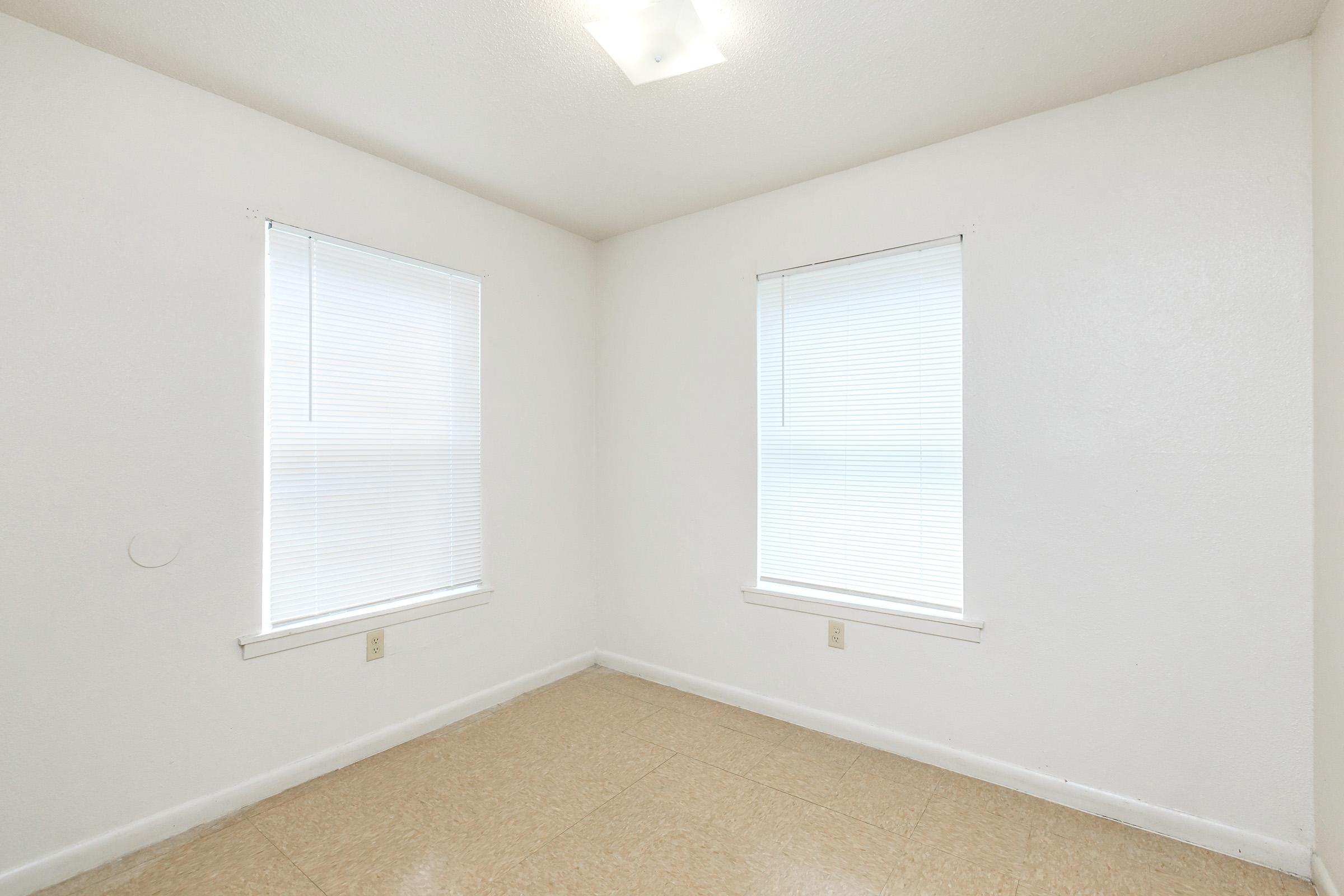 a room with a sink and a window