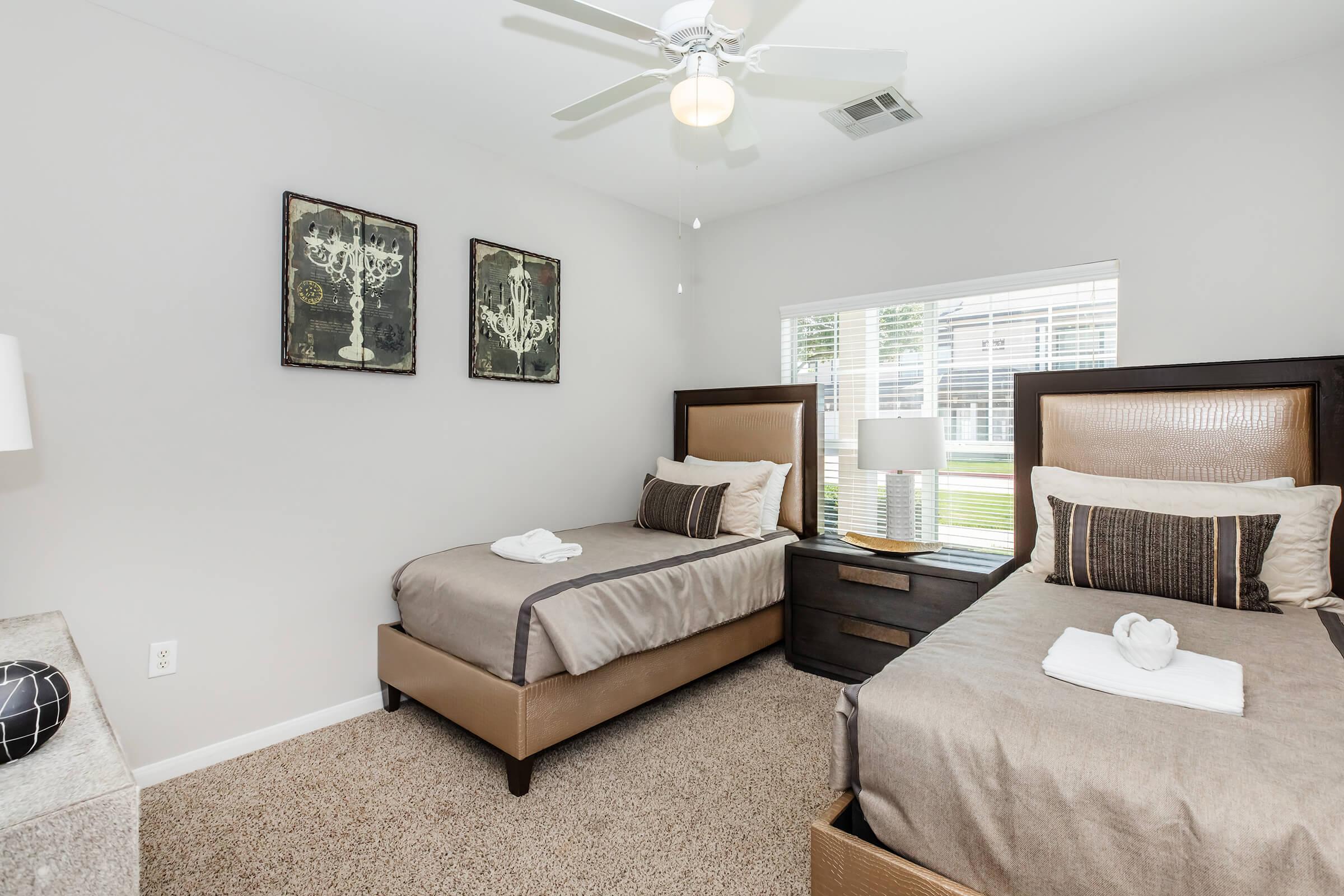 a bedroom with a bed in a hotel room