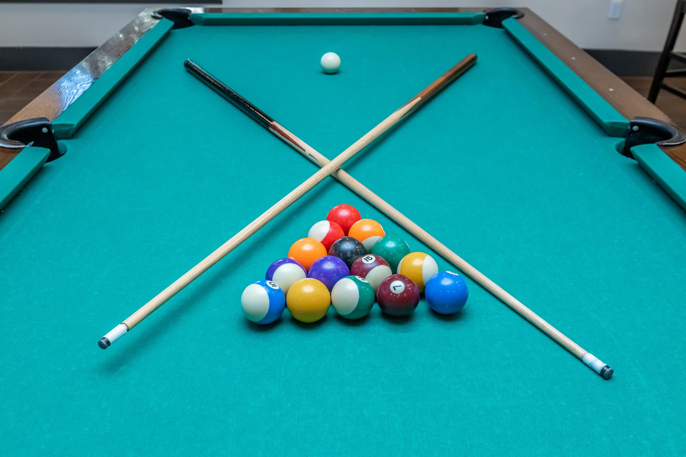 a table topped with a blue ball