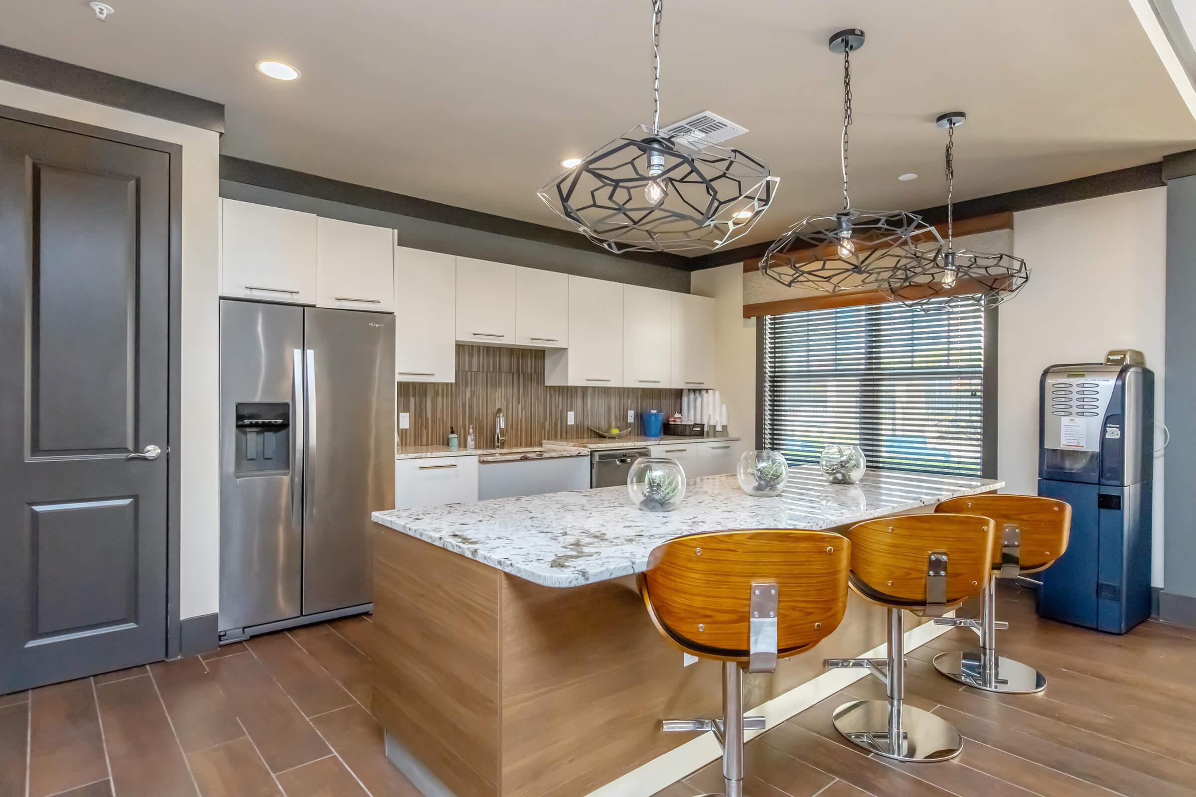 a kitchen with a wooden floor