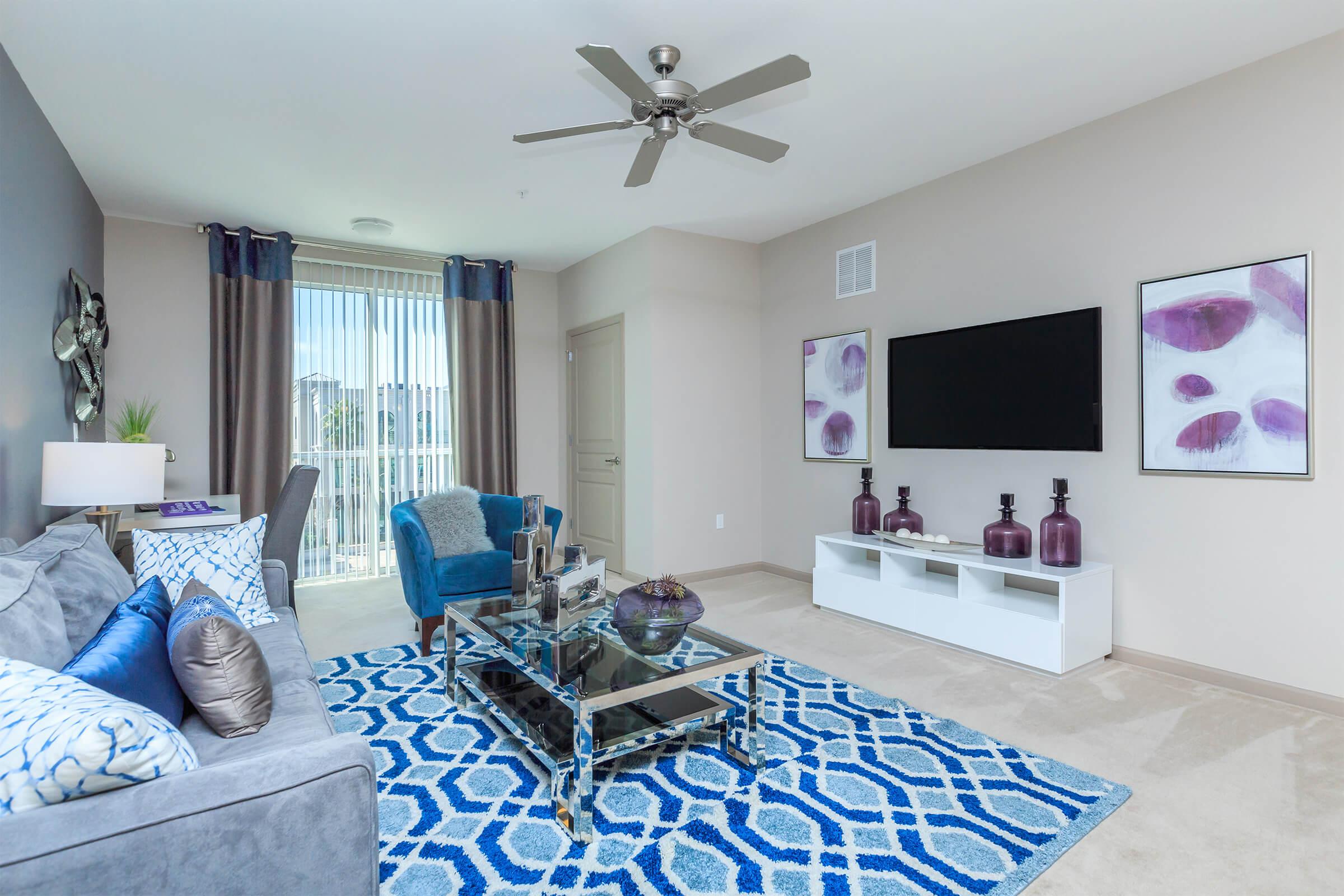 Living room at RiZE at Winter Springs Apartments in Winter Springs, FL