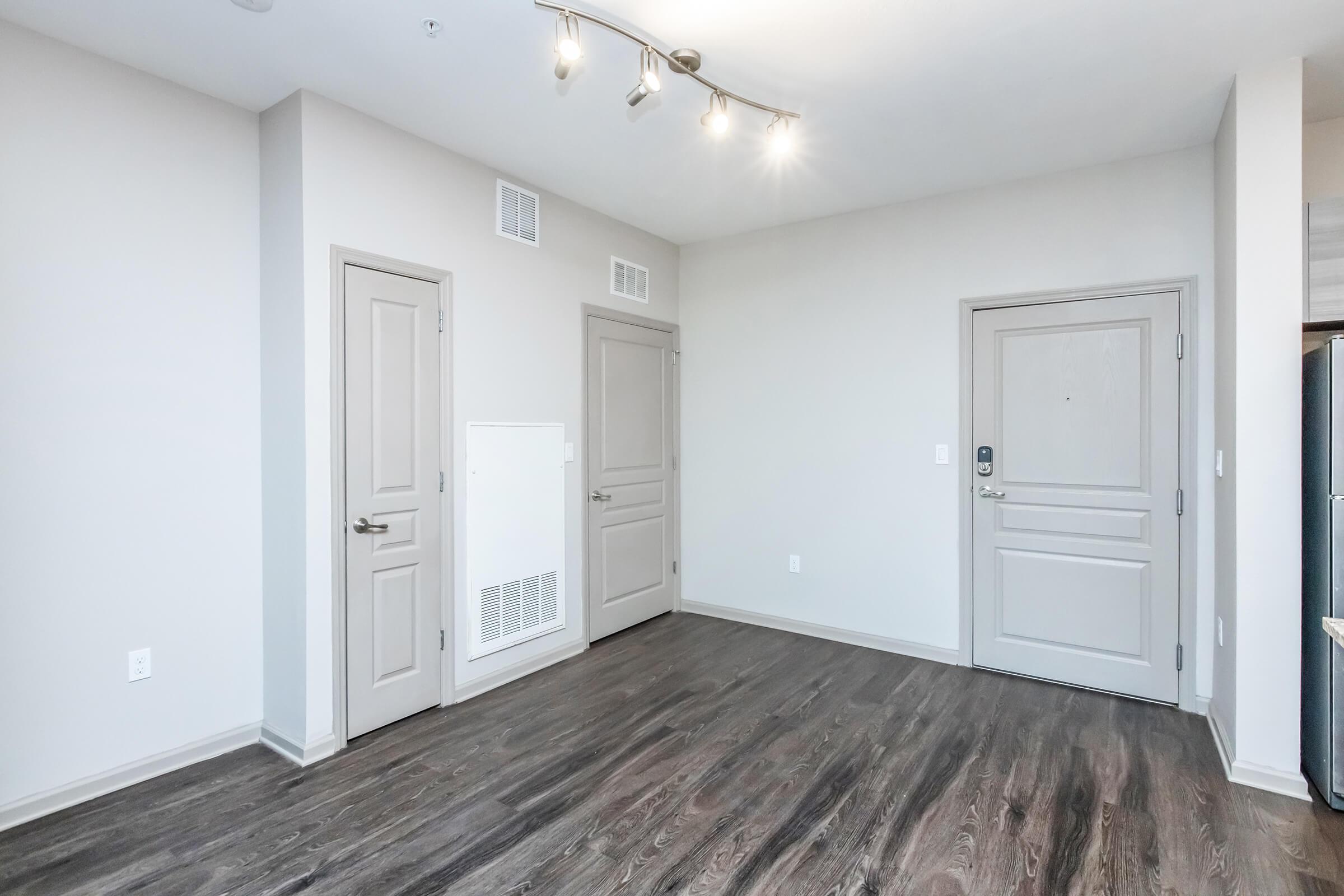 a kitchen with a wooden floor