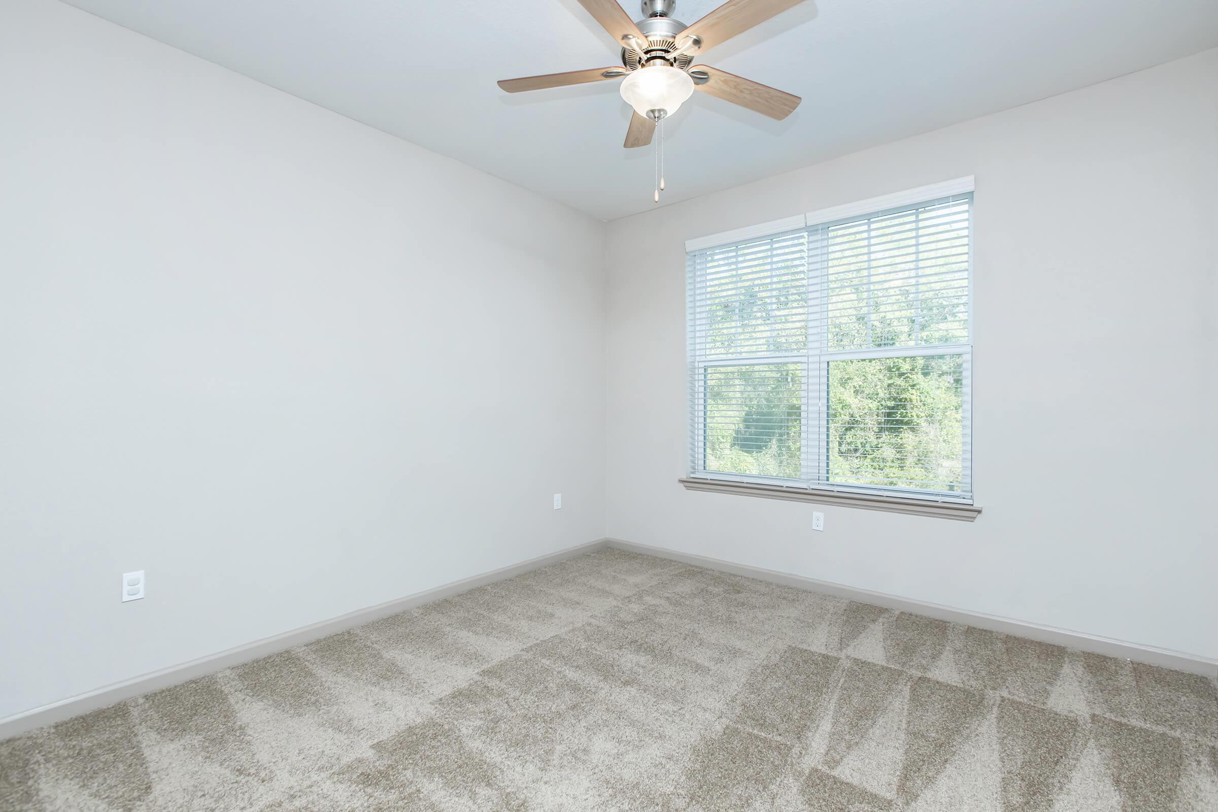 a room with a sink and a window