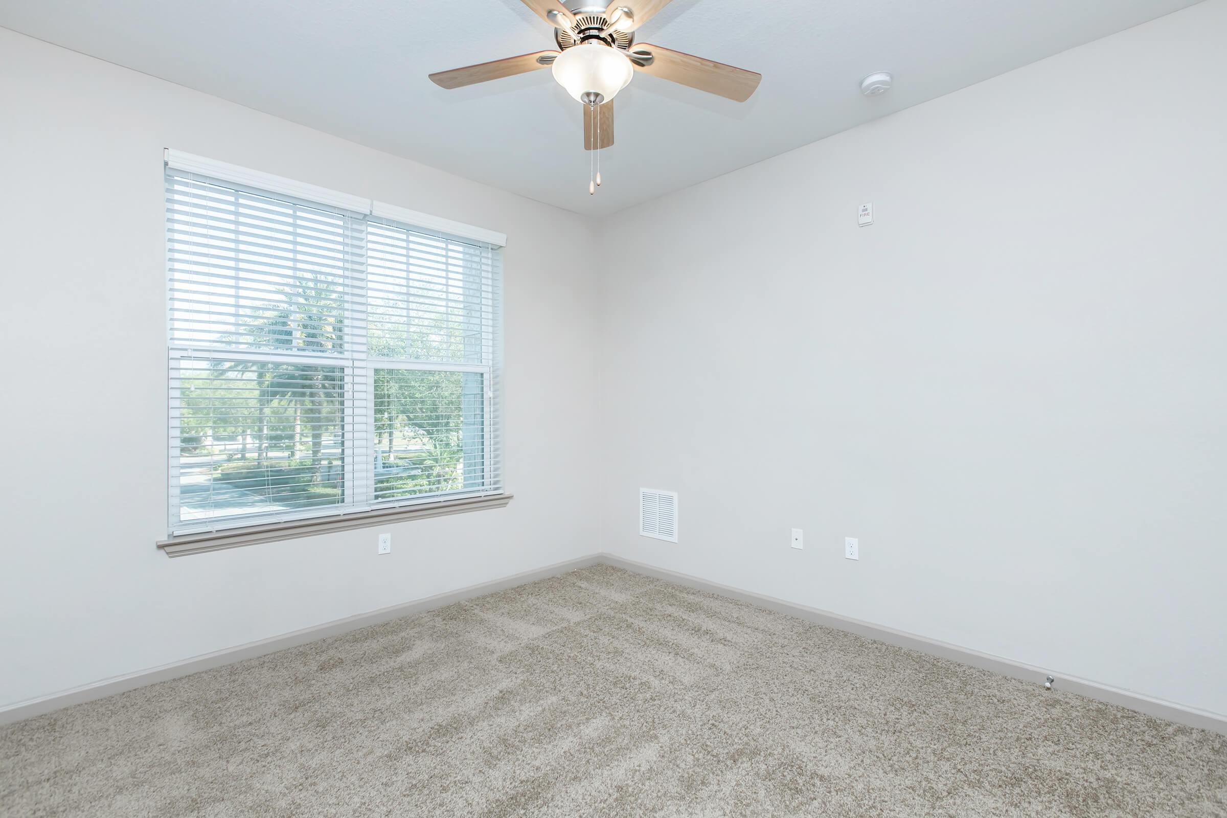 a room with a sink and a window