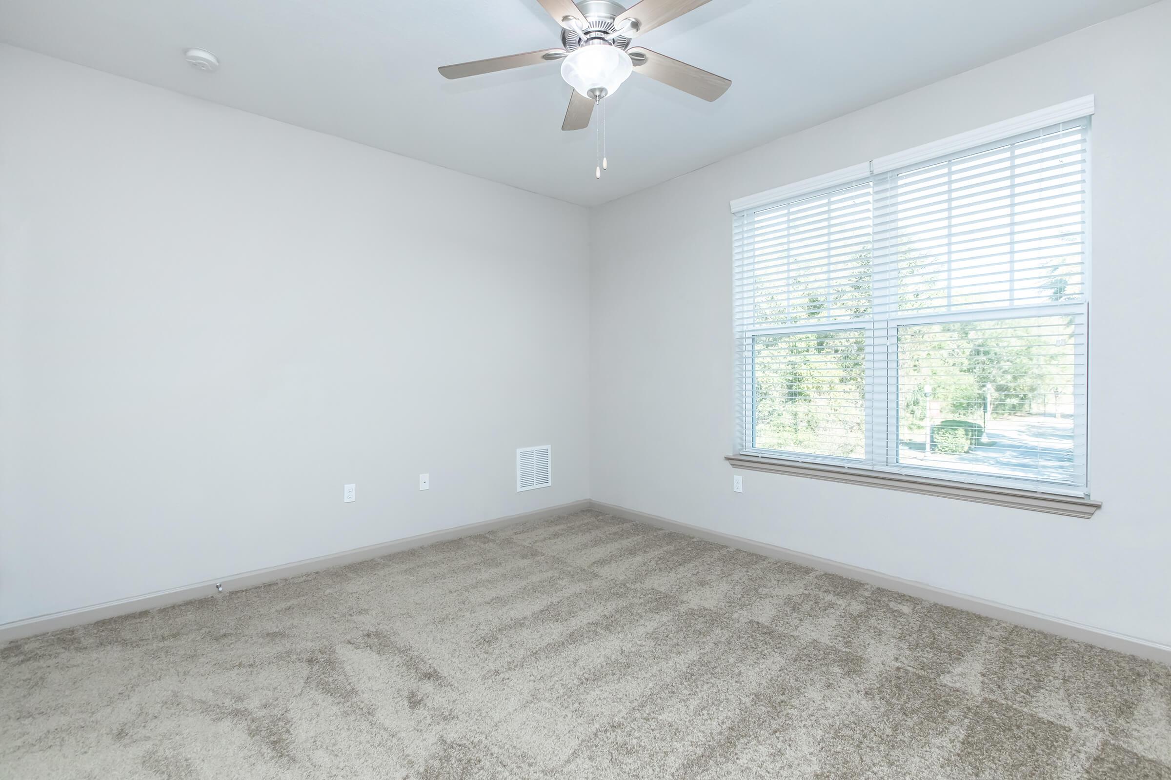 a room with a sink and a window