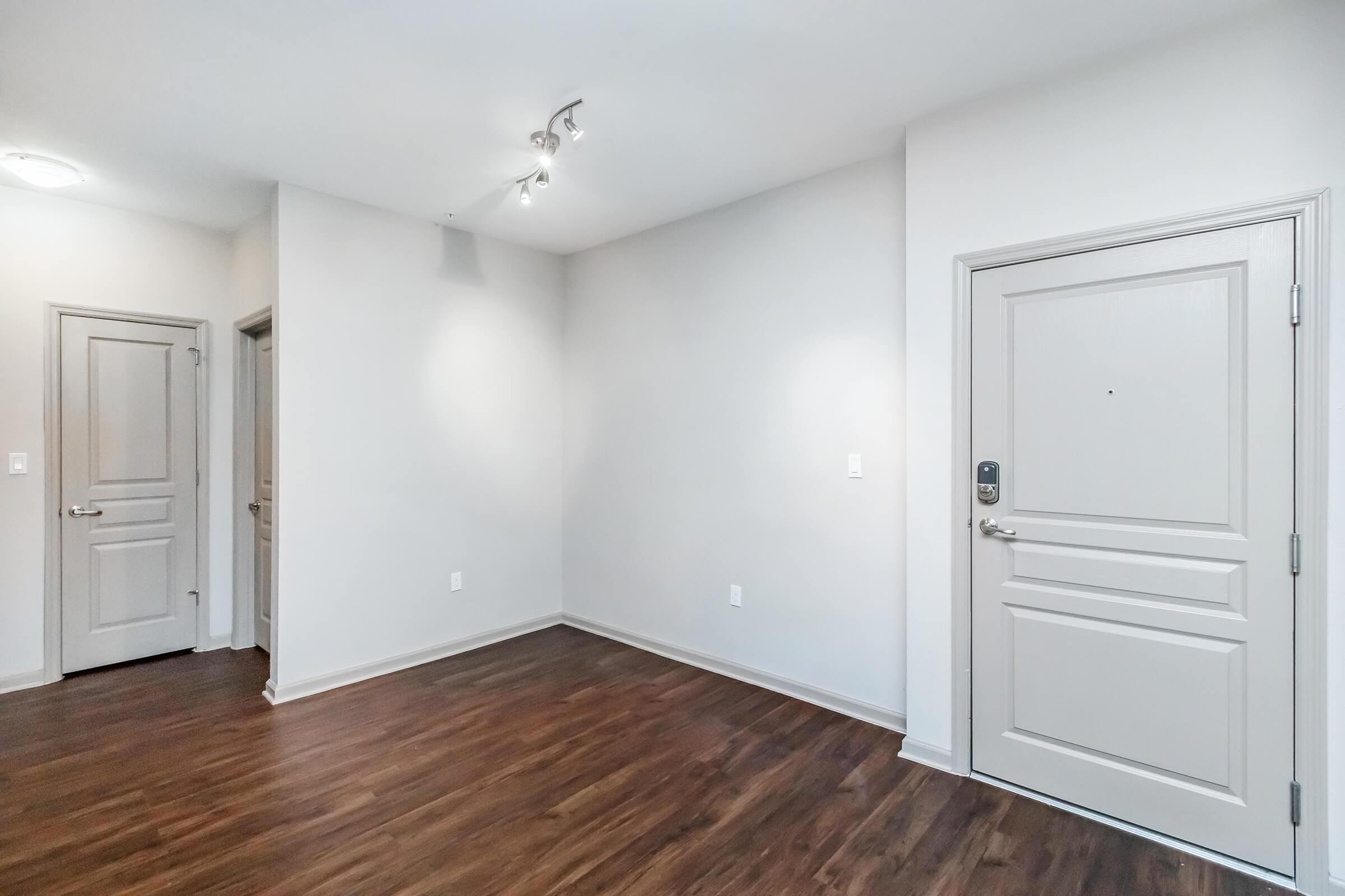 a kitchen with a wood floor