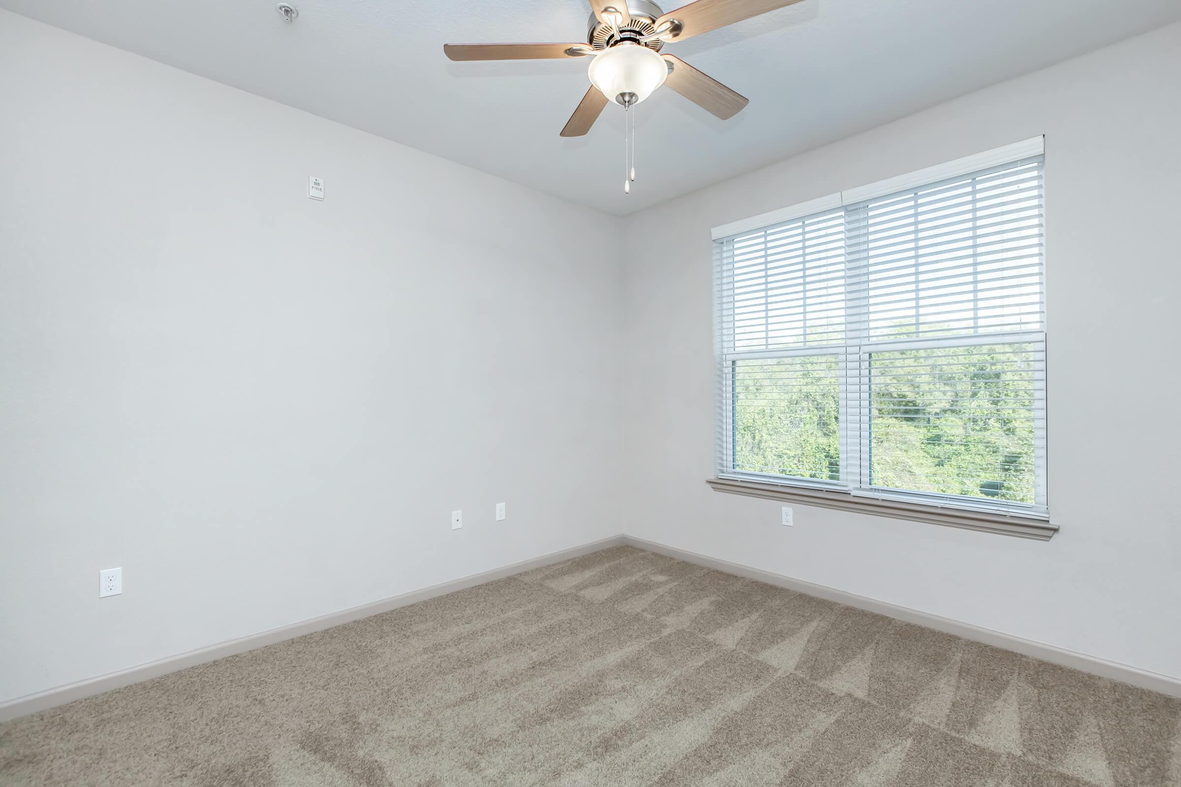 a room with a sink and a window