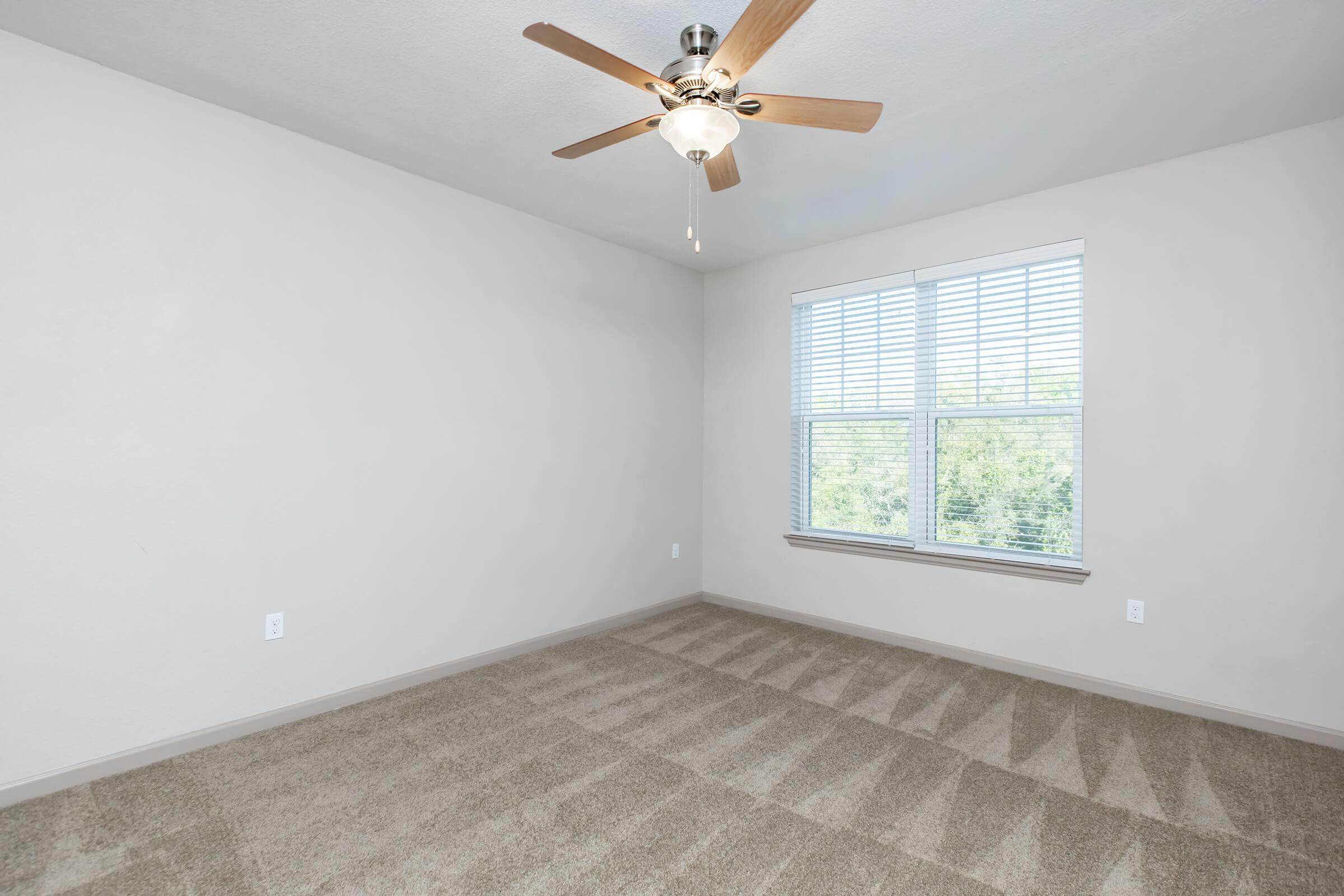 a room with a sink and a window