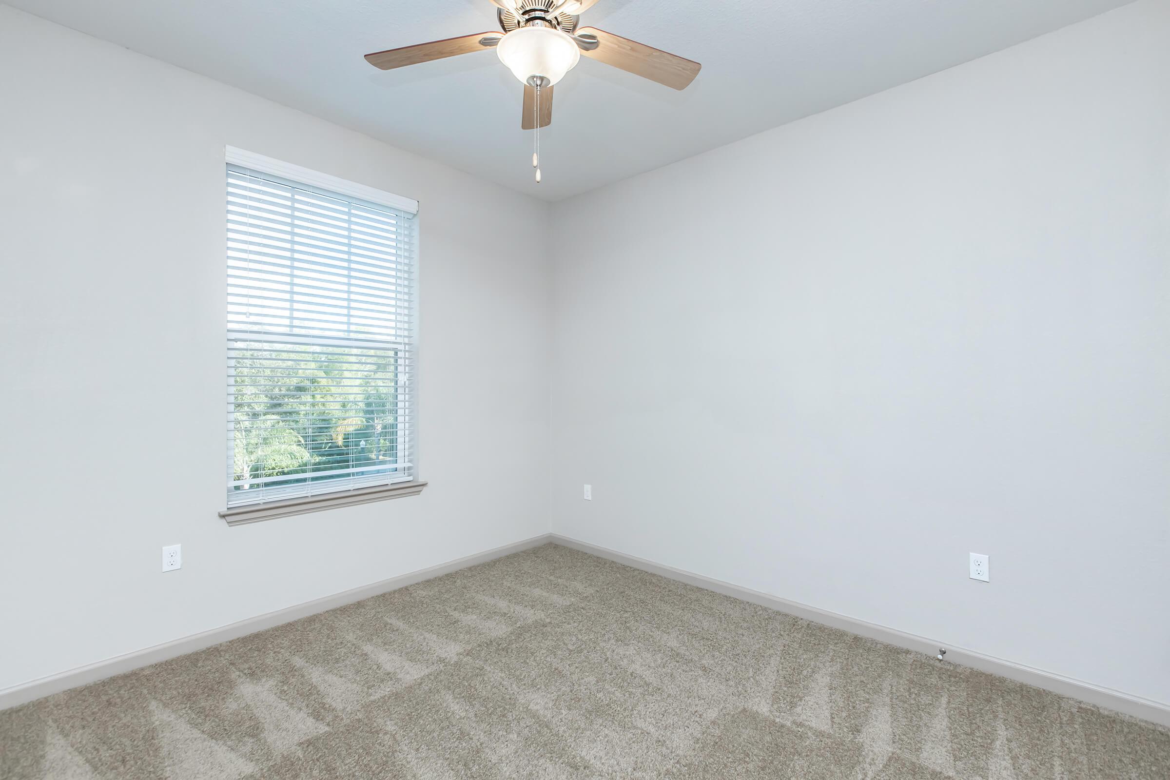 a room with a sink and a window