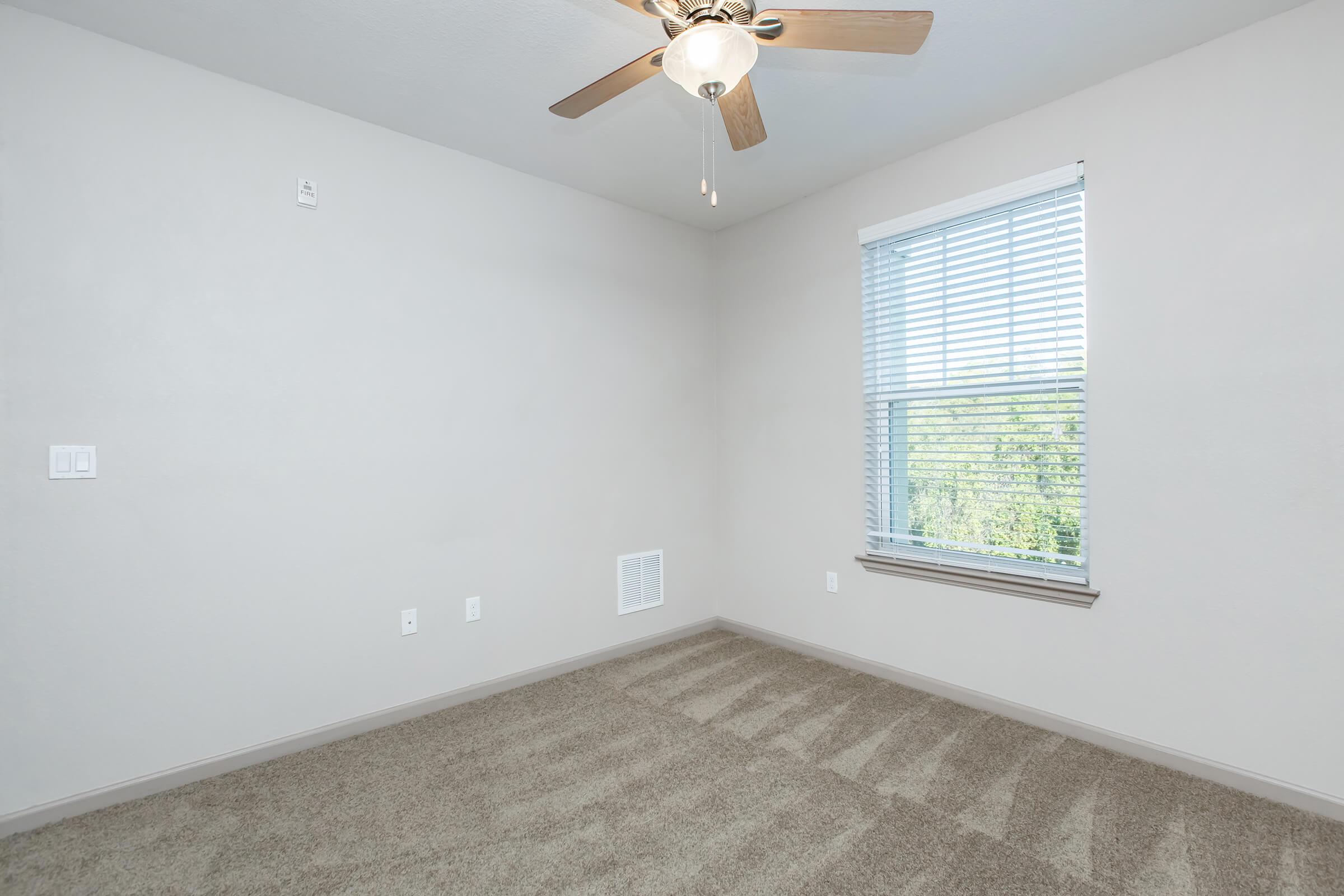 a room with a sink and a window