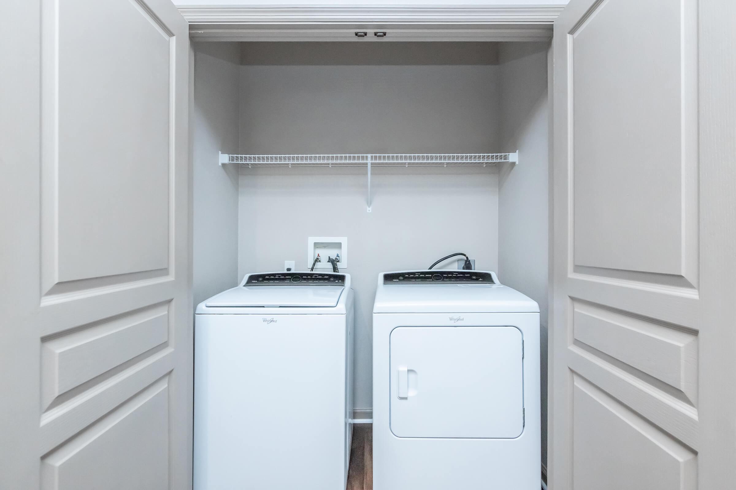 a stove top oven sitting inside of a refrigerator