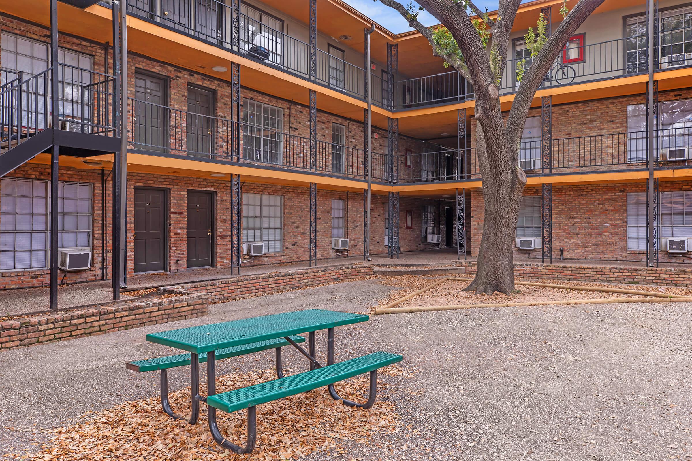 a bench in front of a building