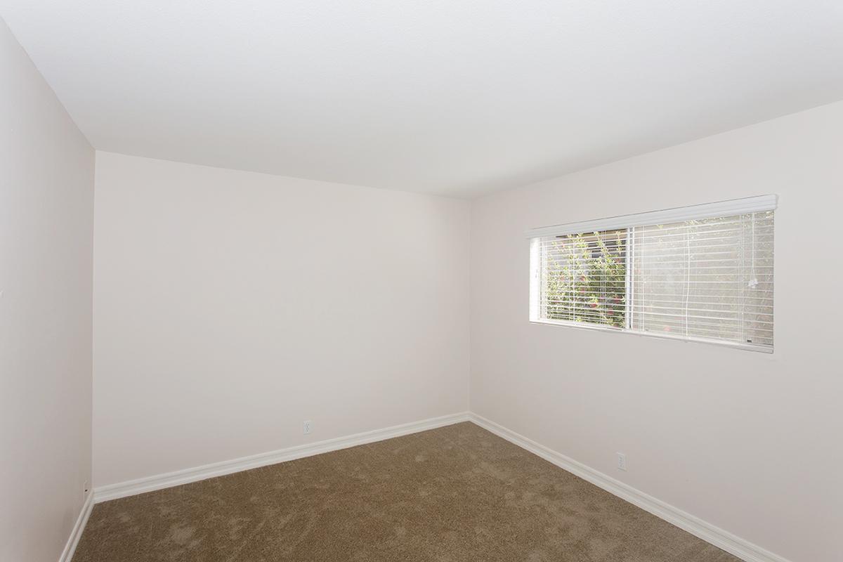 a room with a sink and a window