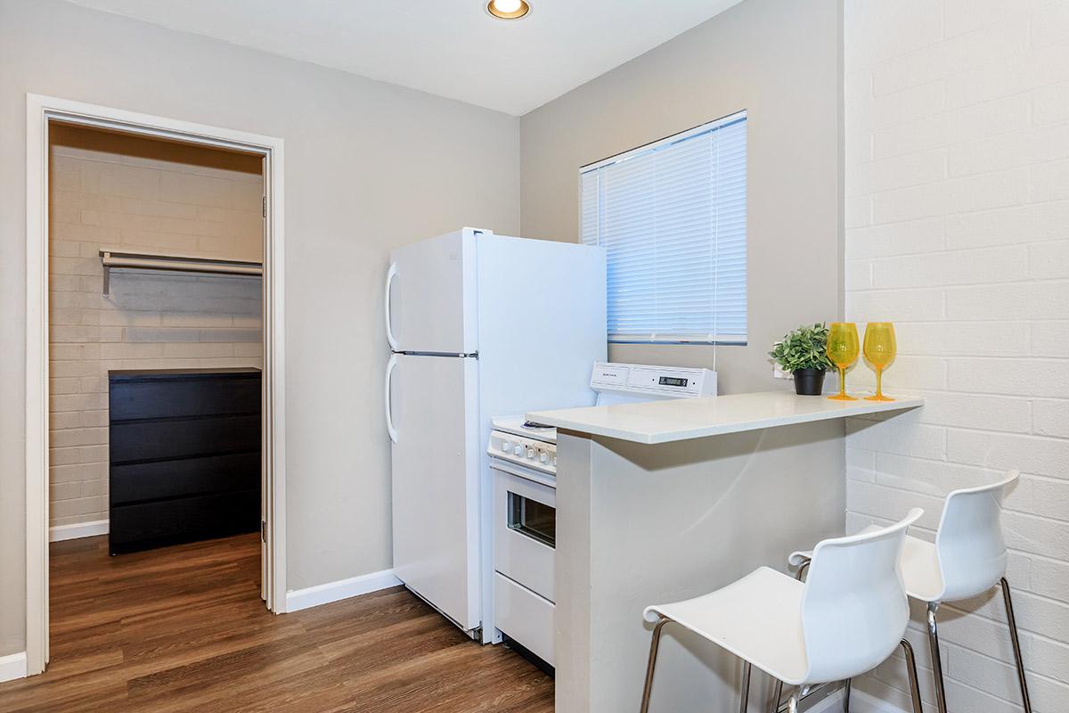 a kitchen with a table in a room