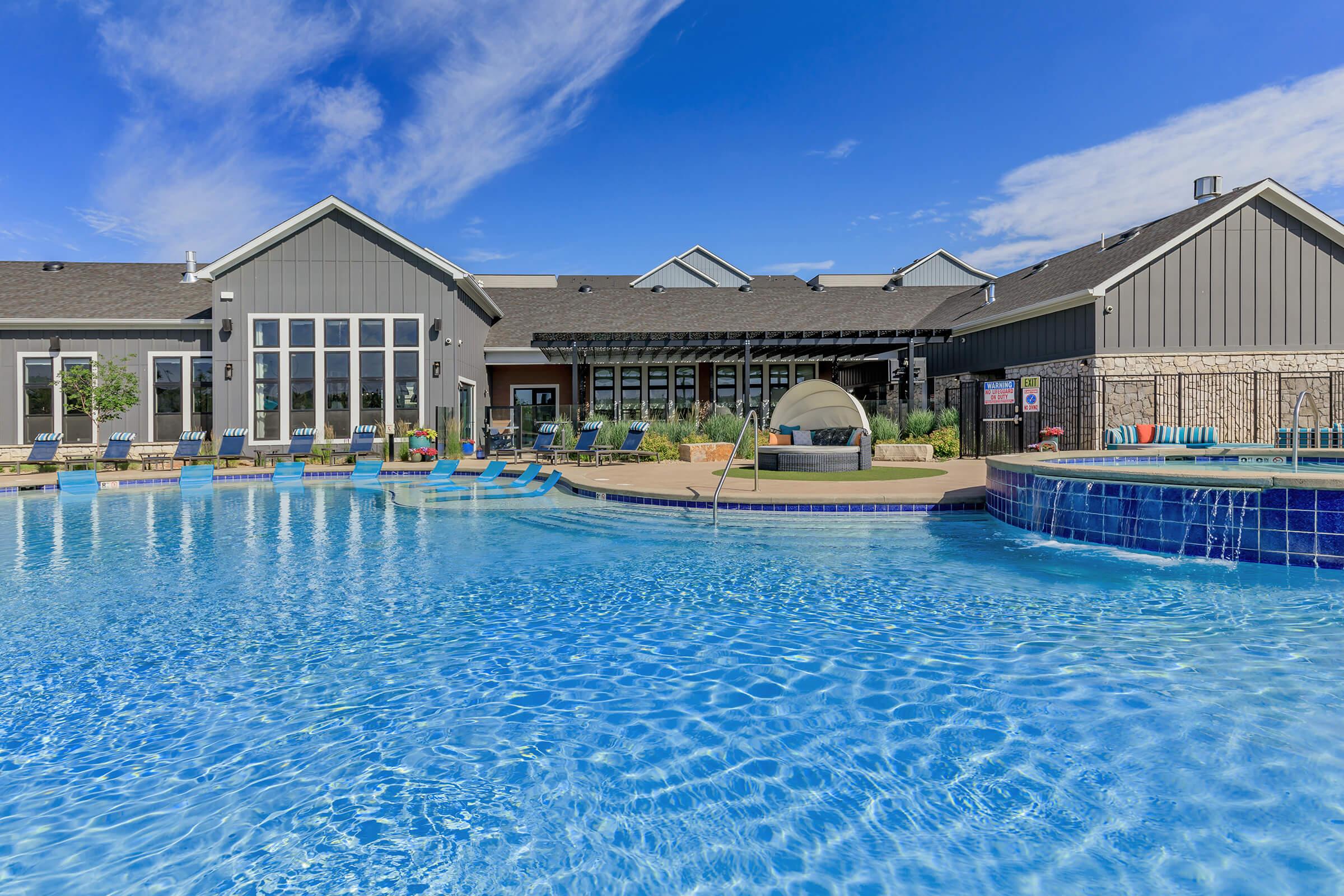 a house with a large pool of water