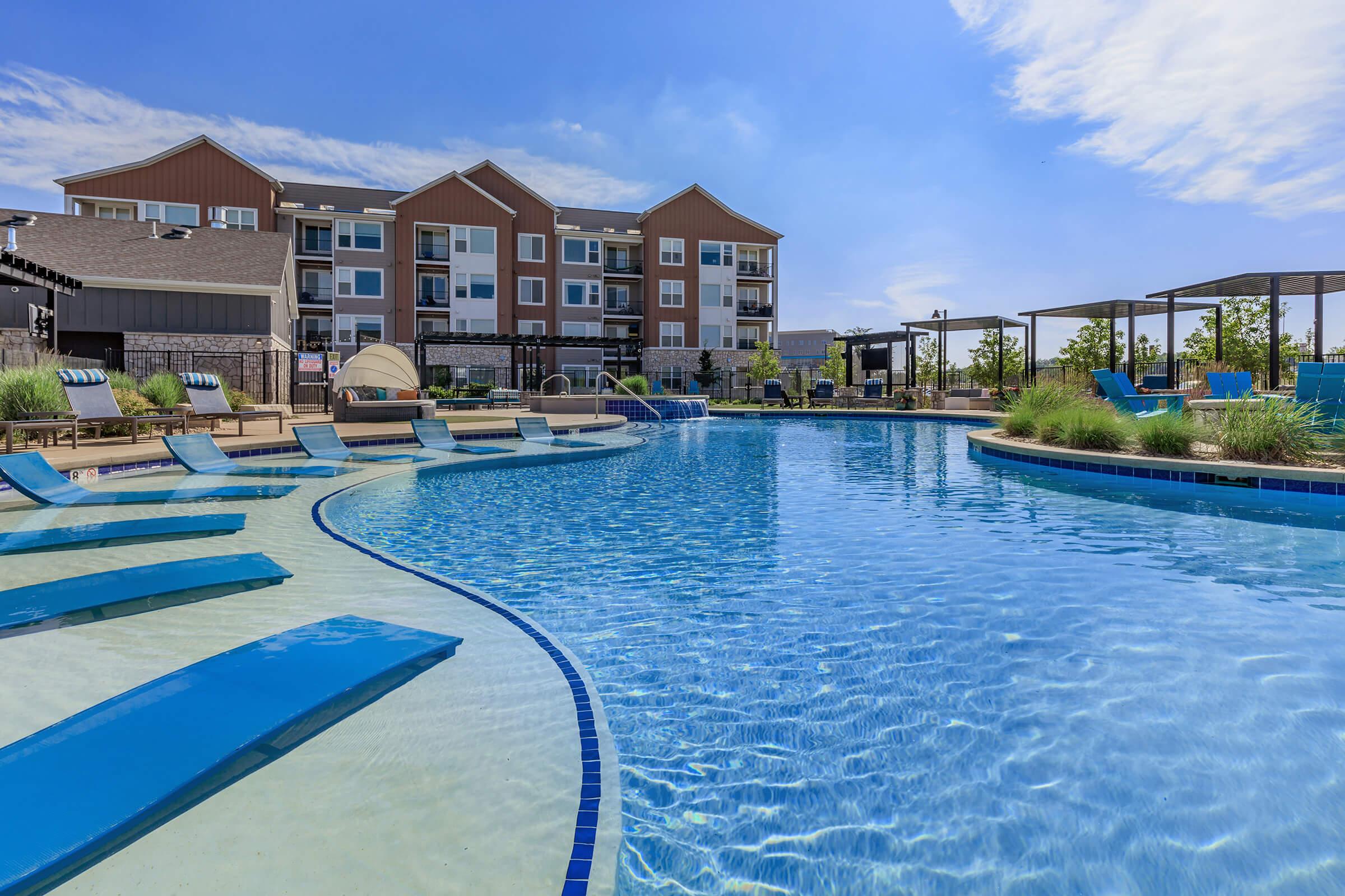 a pool next to a body of water