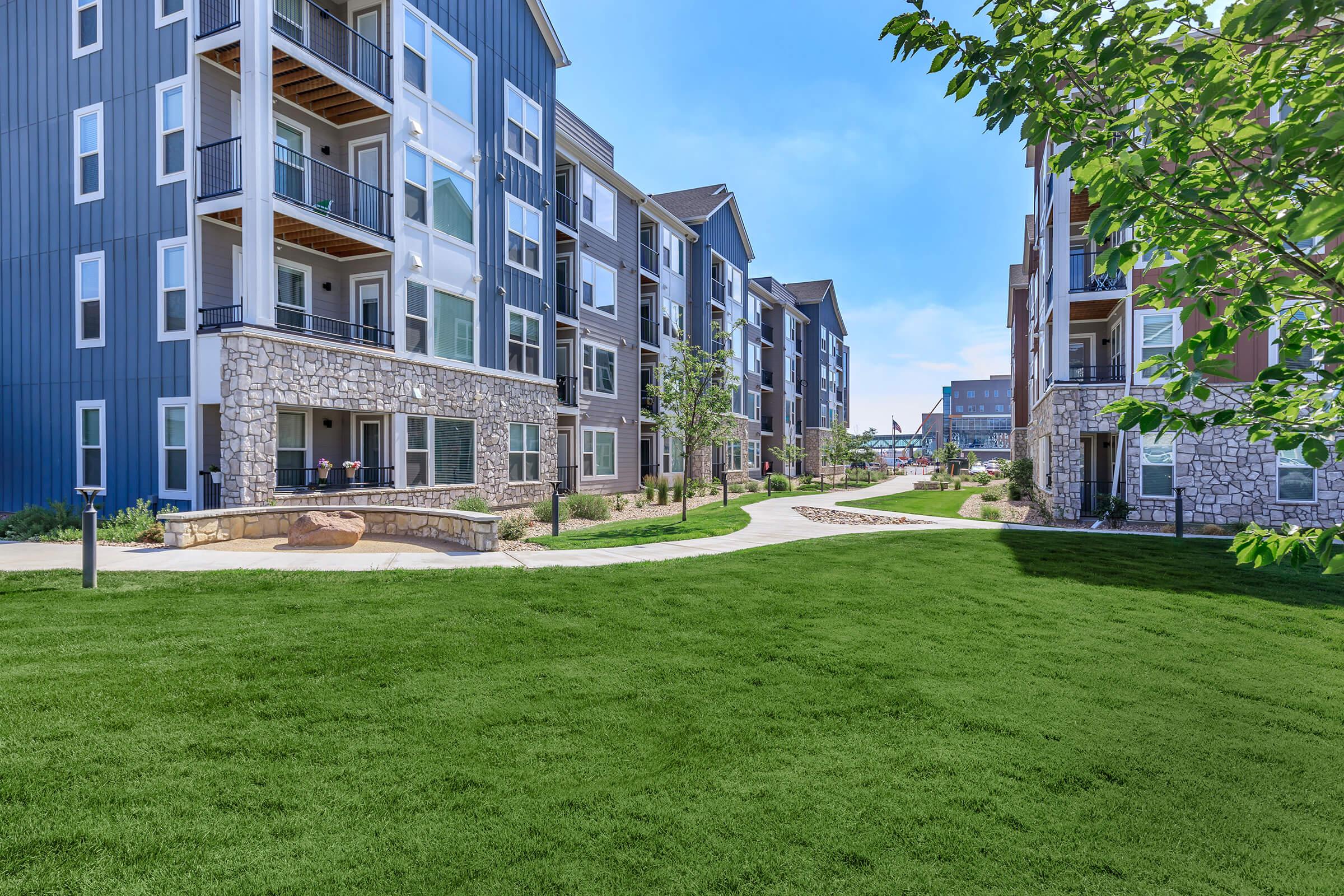 a large lawn in front of a building