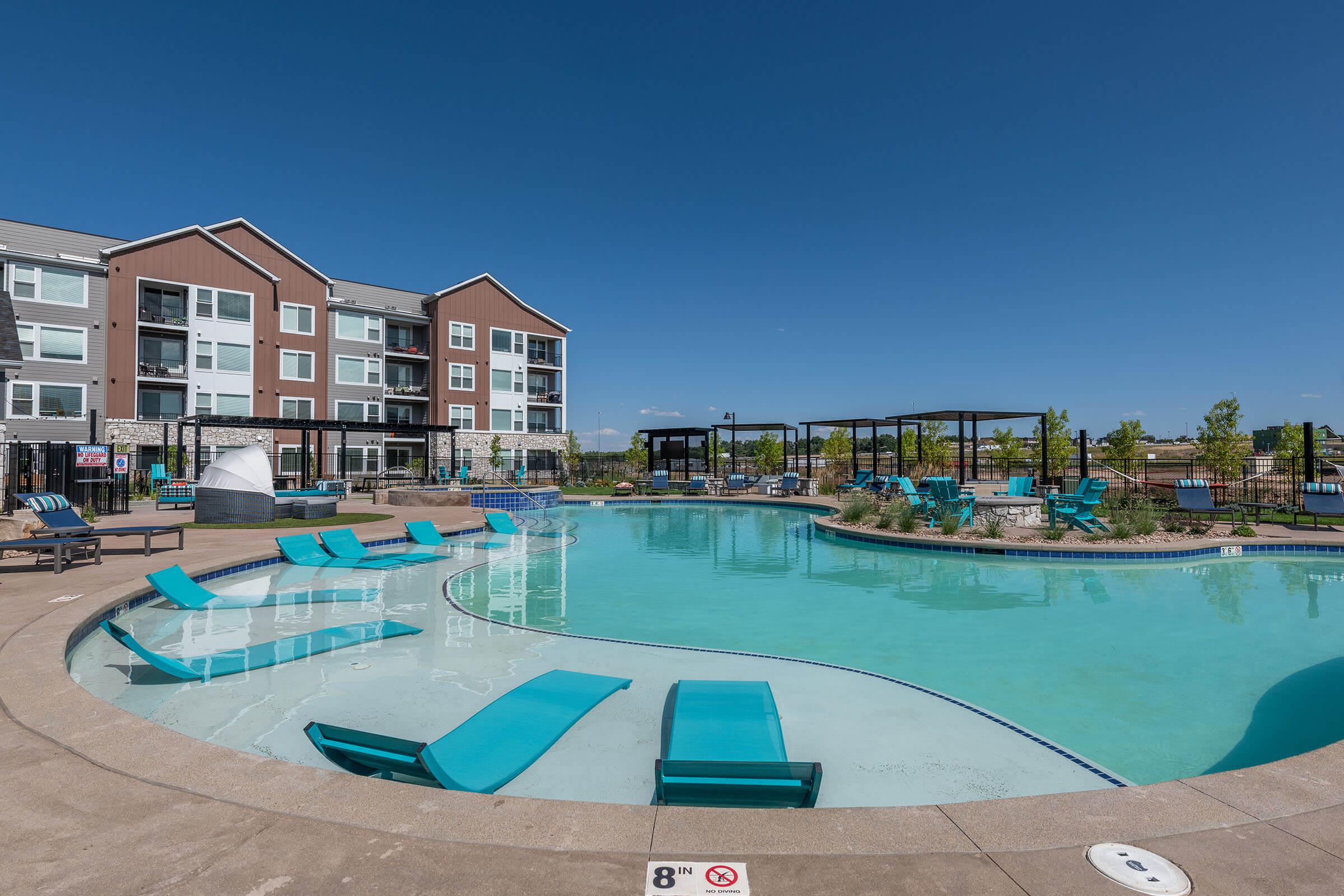 a pool next to a body of water