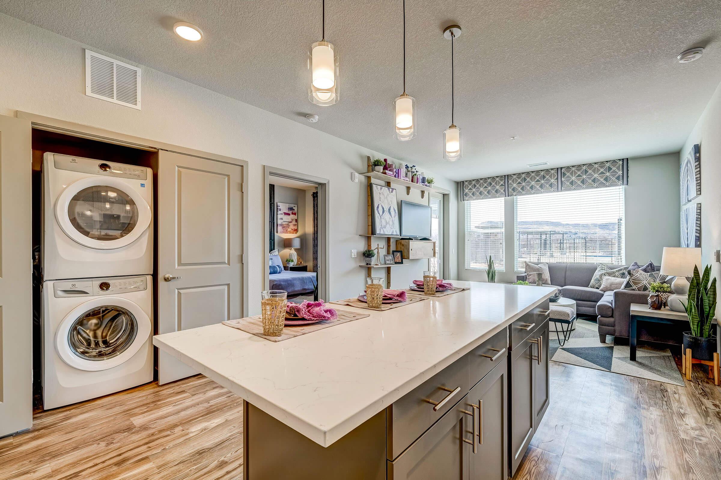 a kitchen with a dining room table