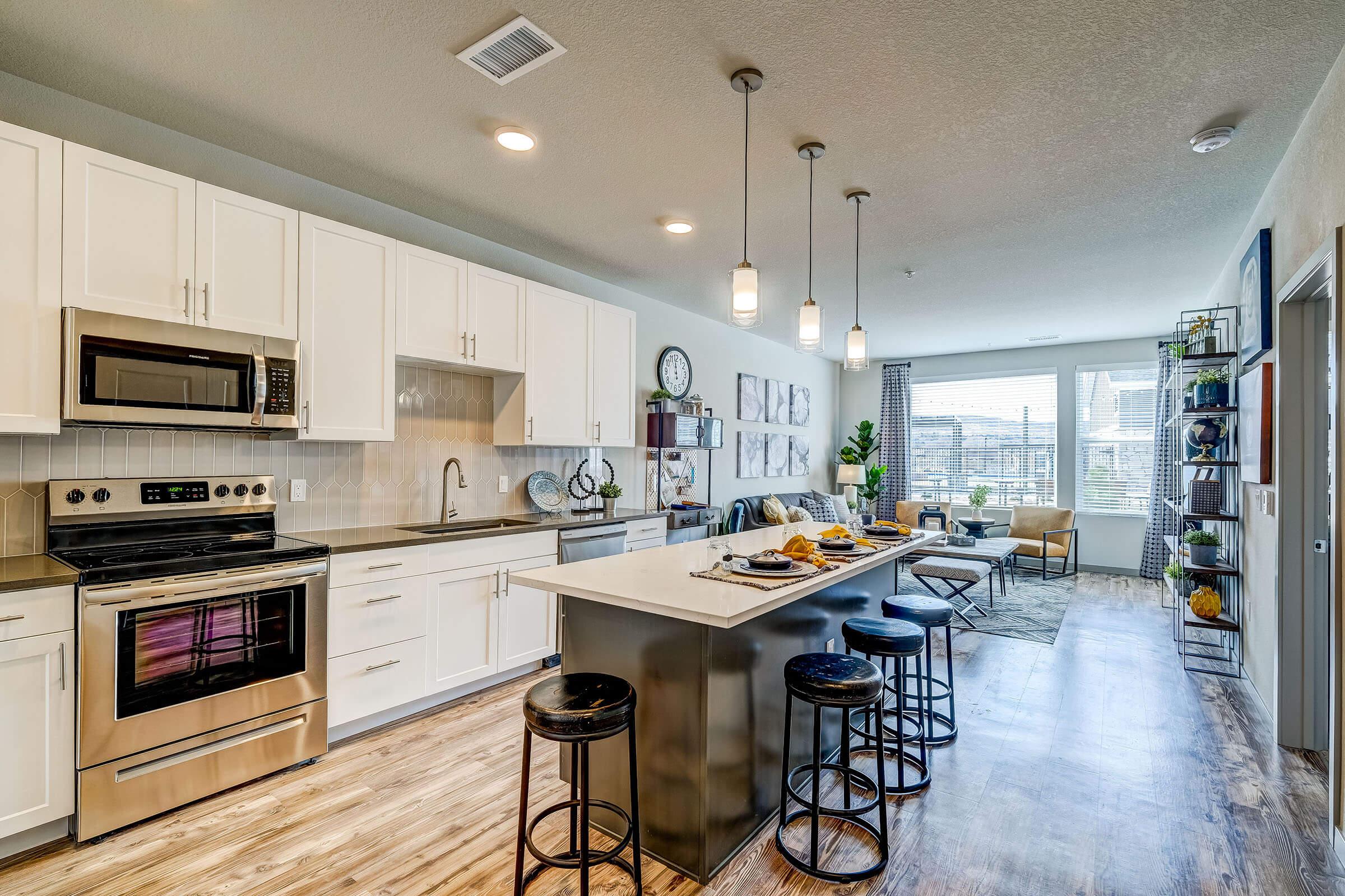 a kitchen with a dining table