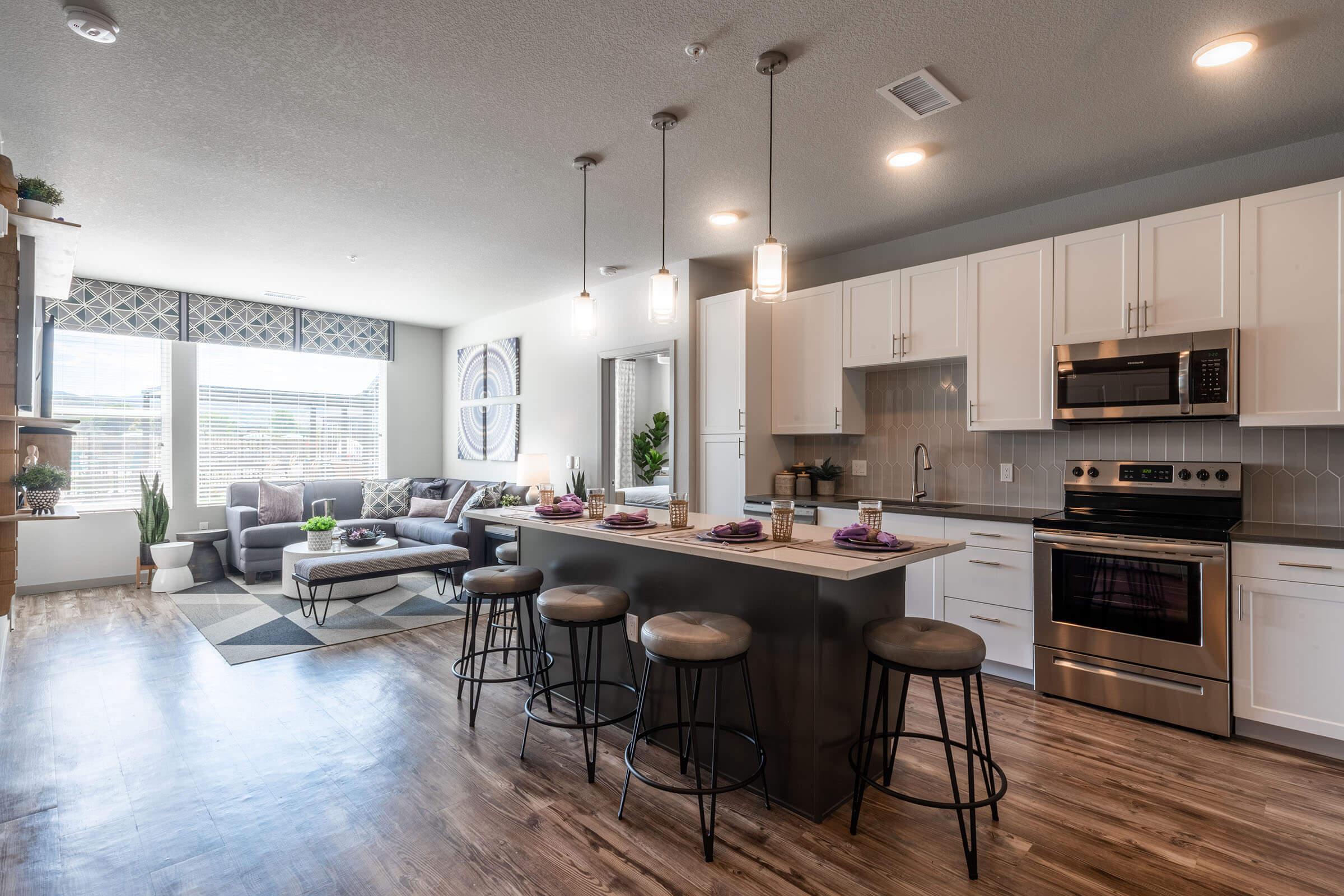 a kitchen with a dining room table